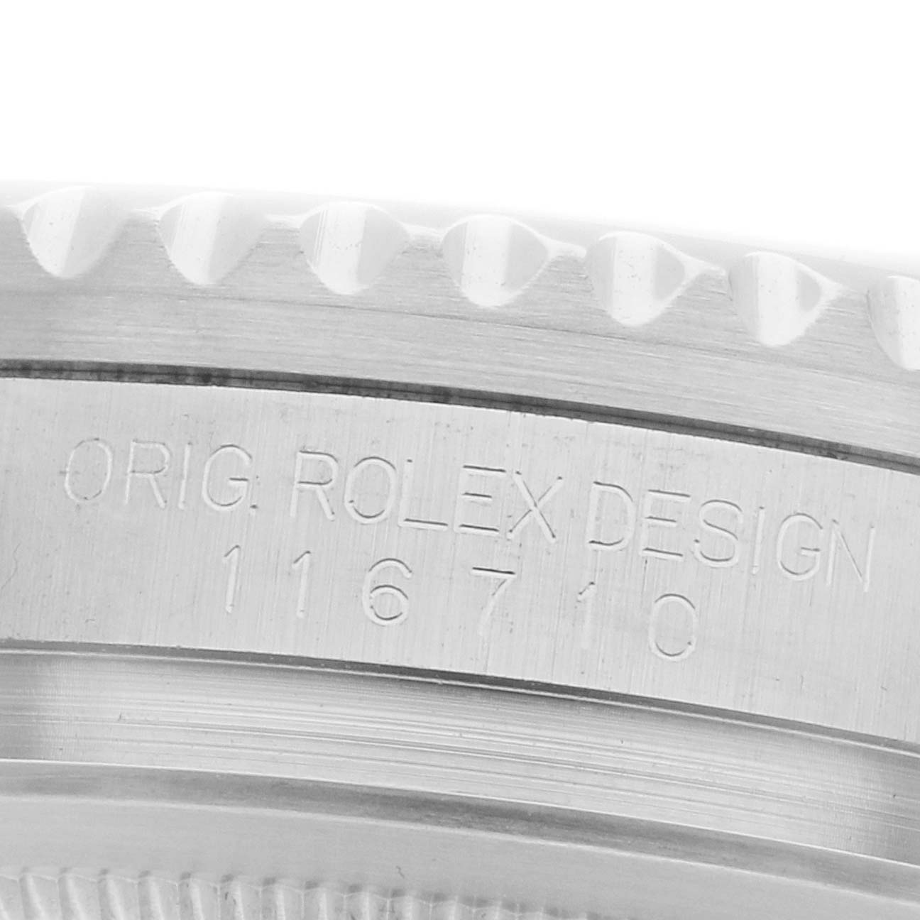 The image shows the side view of a Rolex GMT-Master 116710 Men
s Stainless Steel Black Dial watch, focusing on the engraved model and serial number.