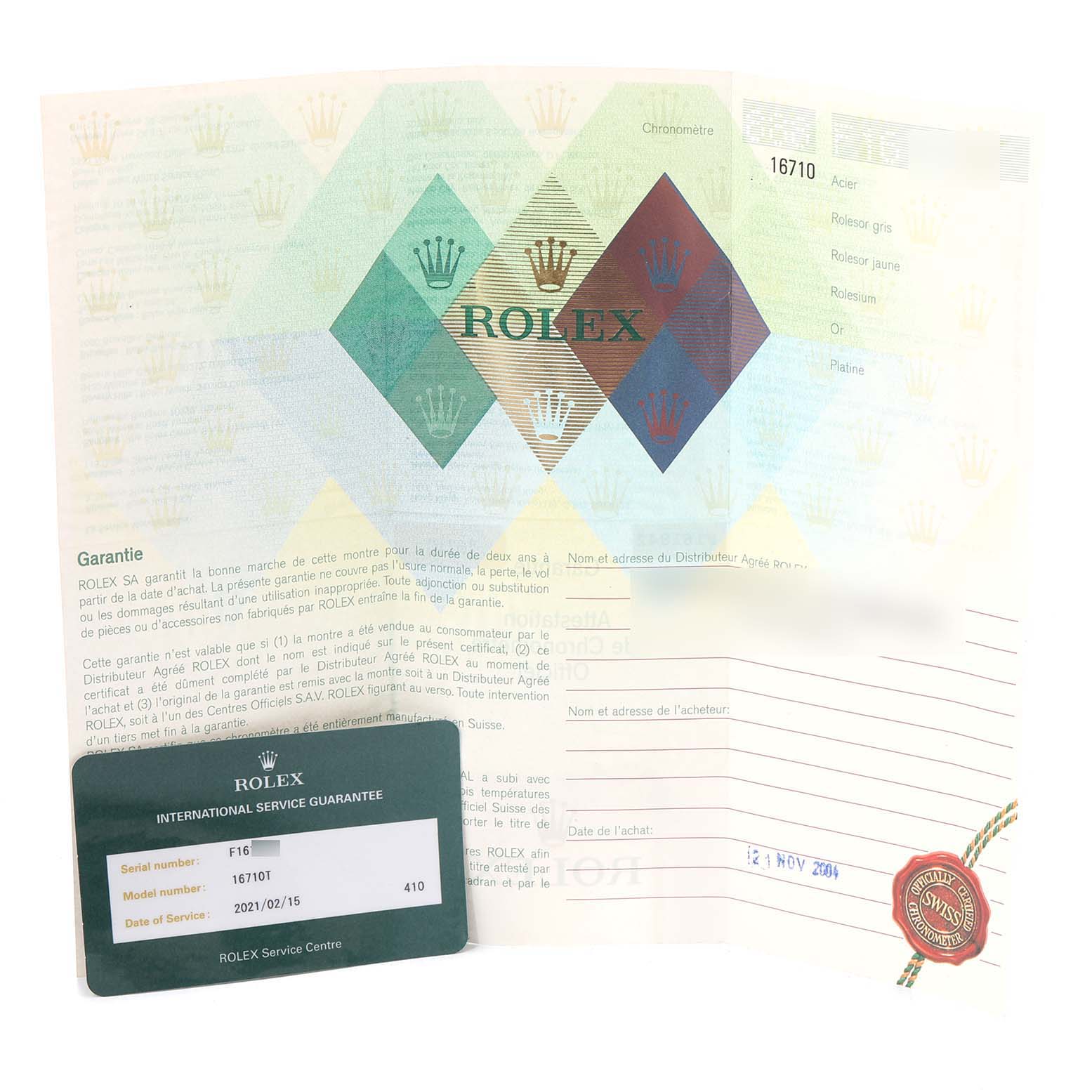 The image shows the guarantee card and paperwork for a Rolex GMT-Master 16710 Men
s Stainless Steel Black Dial 16710 Men
s Stainless Steel Black Dial model.