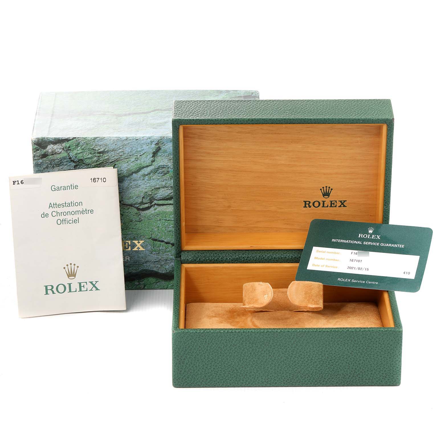 The image shows Rolex GMT-Master 16710 Men
s Stainless Steel Black Dial 16710 Men
s Stainless Steel Black Dial accessories, including the original box, warranty card, and a manual.