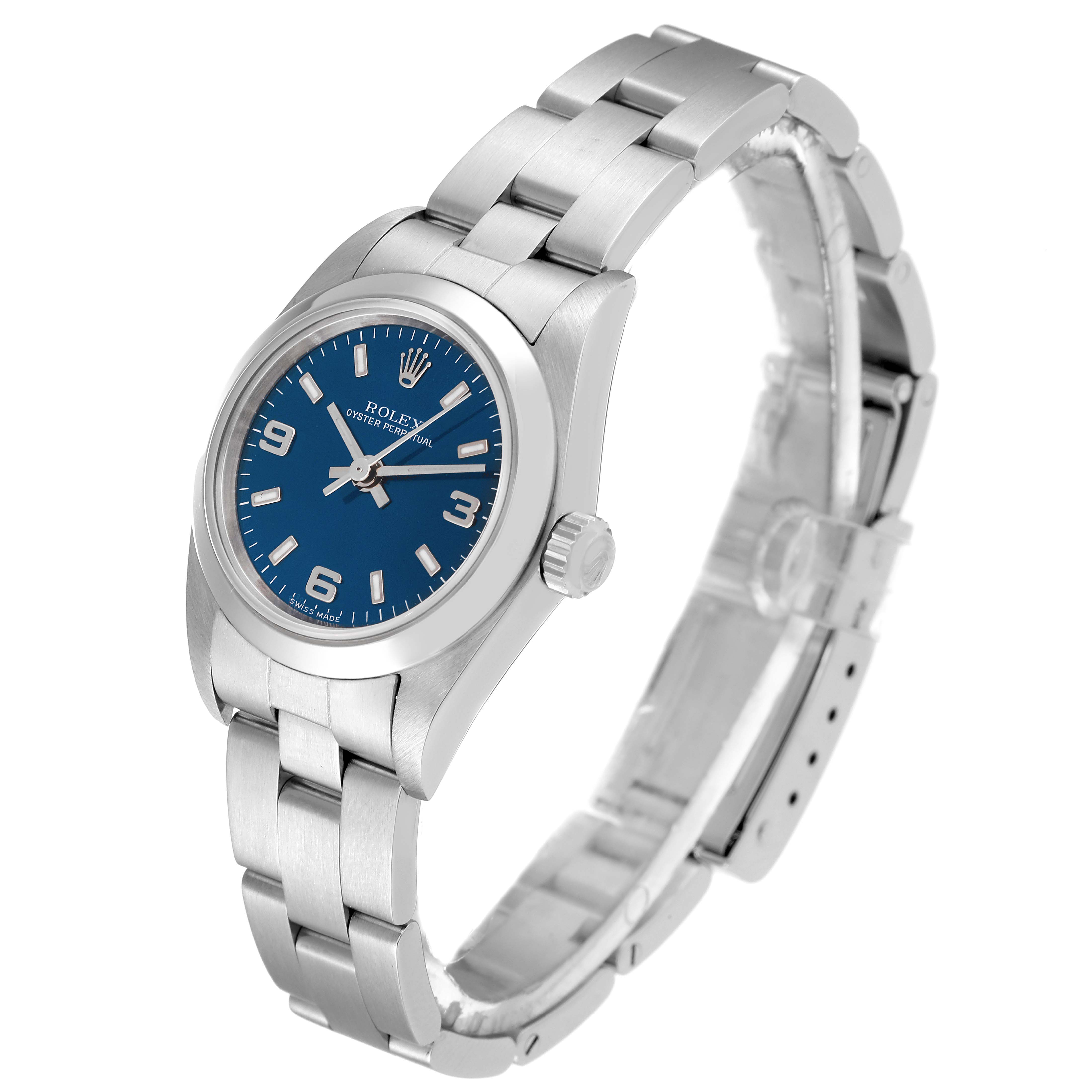 The image shows a Rolex Oyster Perpetual 76080 Women's Stainless Steel Blue Dial 76080 Women's Stainless Steel Blue Dial watch at an angled view, featuring the blue dial, case, bracelet, and crown.