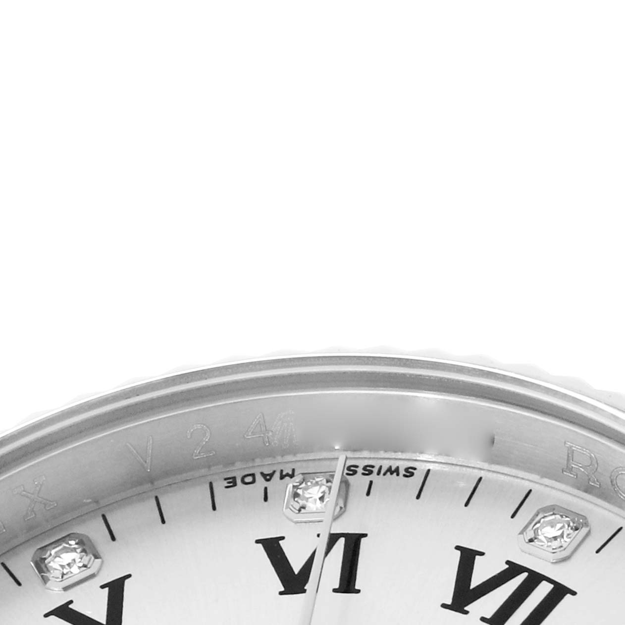 The image shows a close-up of the dial and bezel of a Rolex Oyster Perpetual 116034 Men
s Stainless Steel Silver Dial watch, featuring Roman numerals and diamond markers.