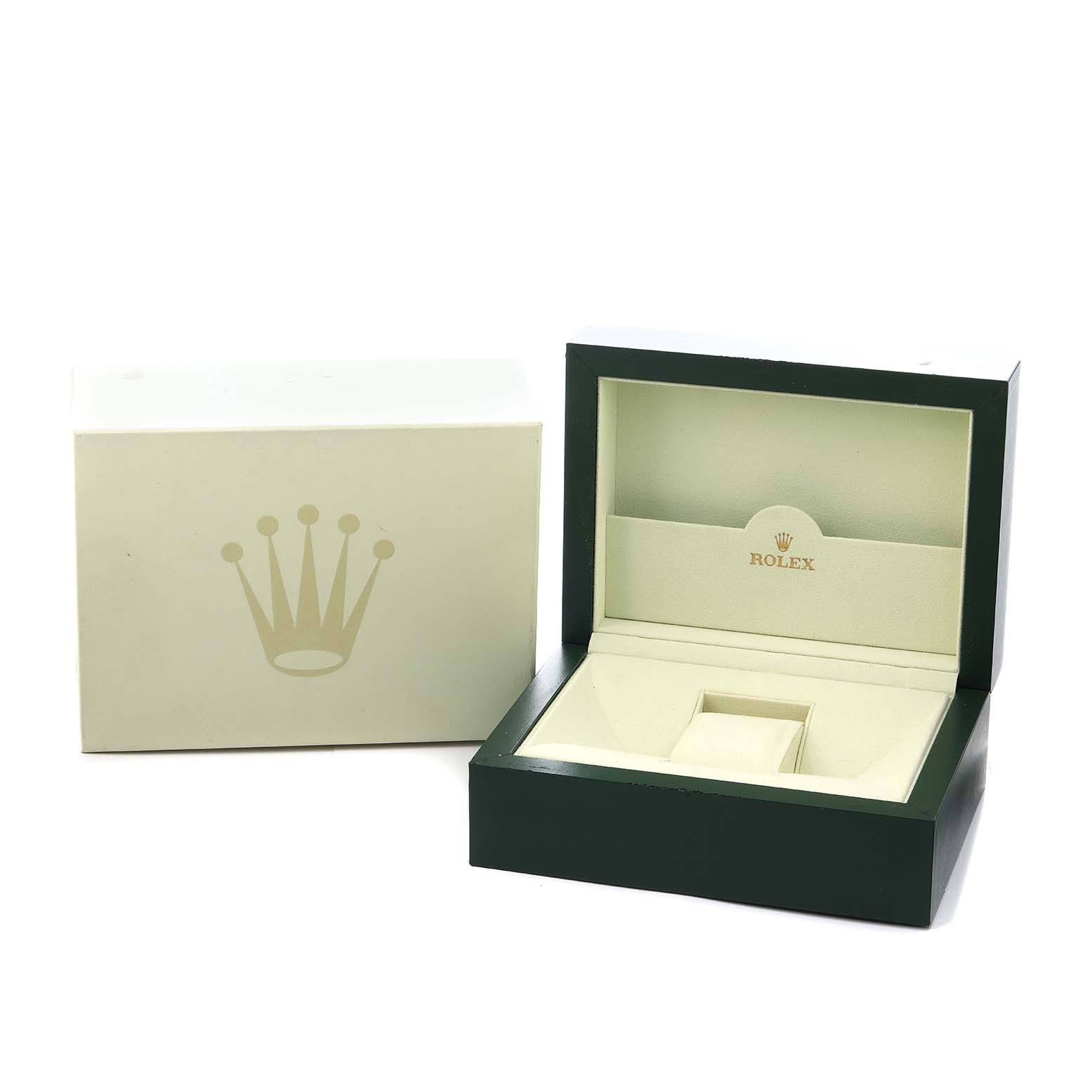 The image shows a Rolex Oyster Perpetual 116034 Men
s Stainless Steel Silver Dial watch box open at an angle, displaying the inner compartments.