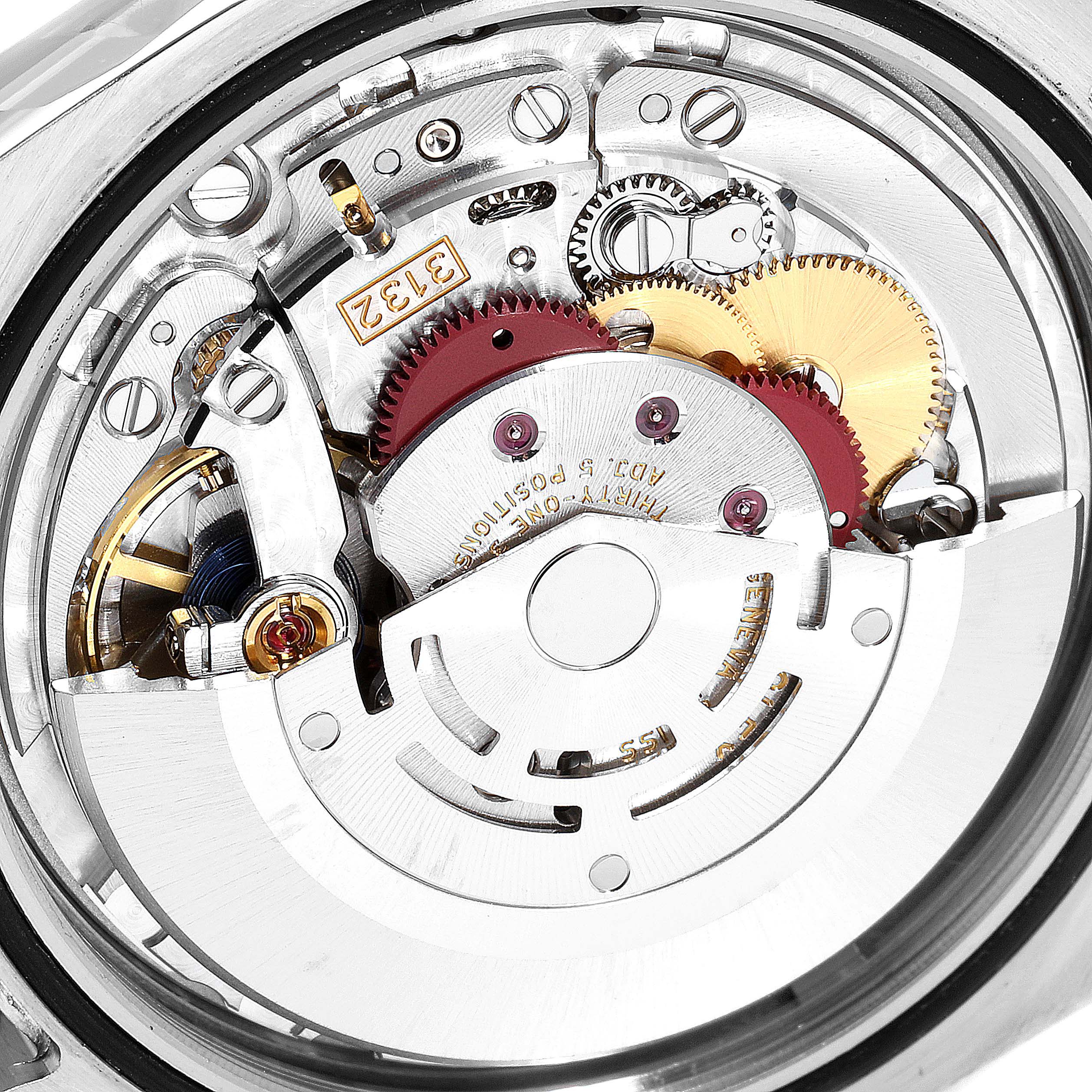 The image shows the internal mechanical movement of a Rolex Oyster Perpetual 114300 Men's Stainless Steel Blue Dial 114300 Men's Stainless Steel Blue Dial watch at a close-up angle.