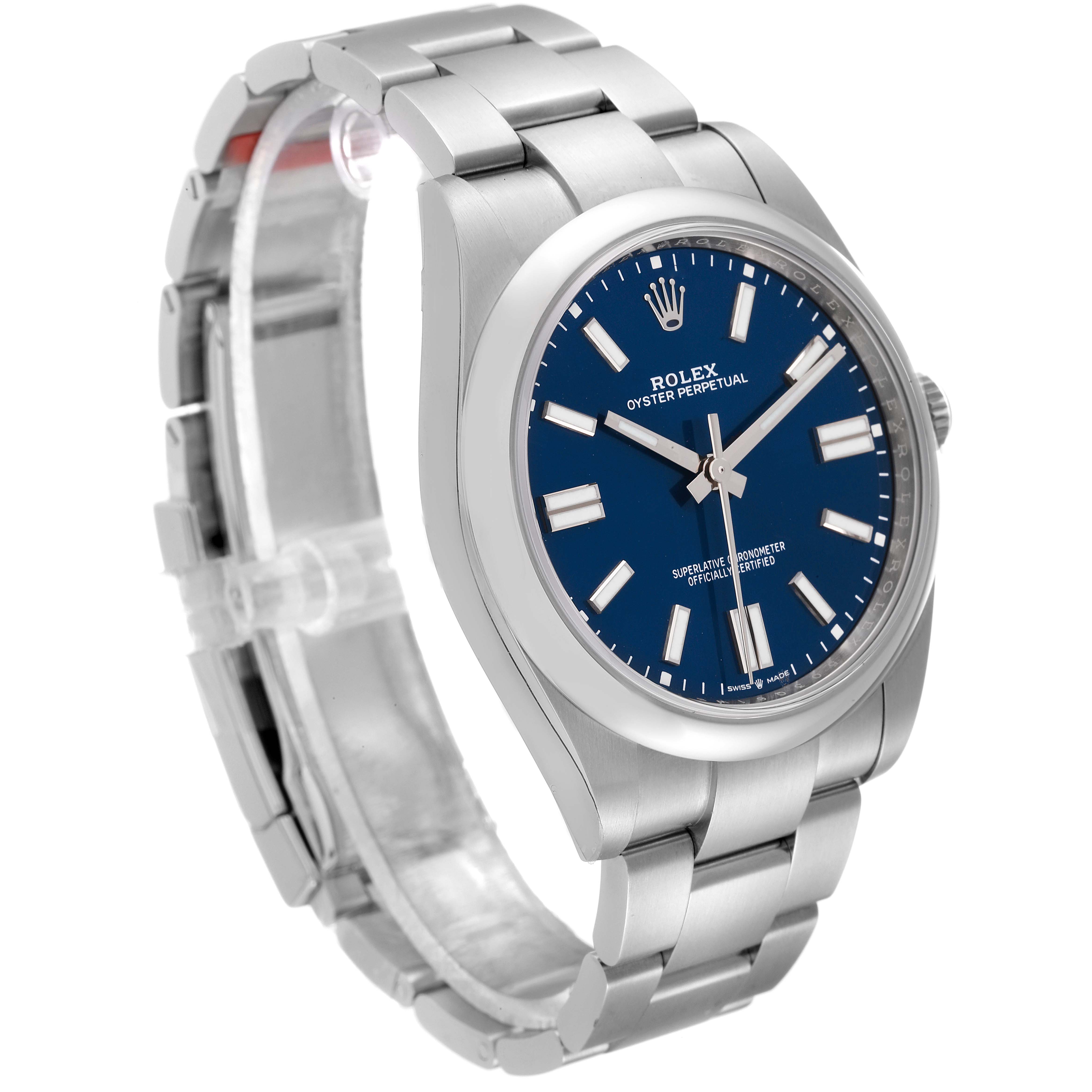 The Rolex Oyster Perpetual 124300 Men's Stainless Steel Blue Dial 124300 Men's Stainless Steel Blue Dial watch is shown at a three-quarter angle, displaying the face, bezel, and metal bracelet.