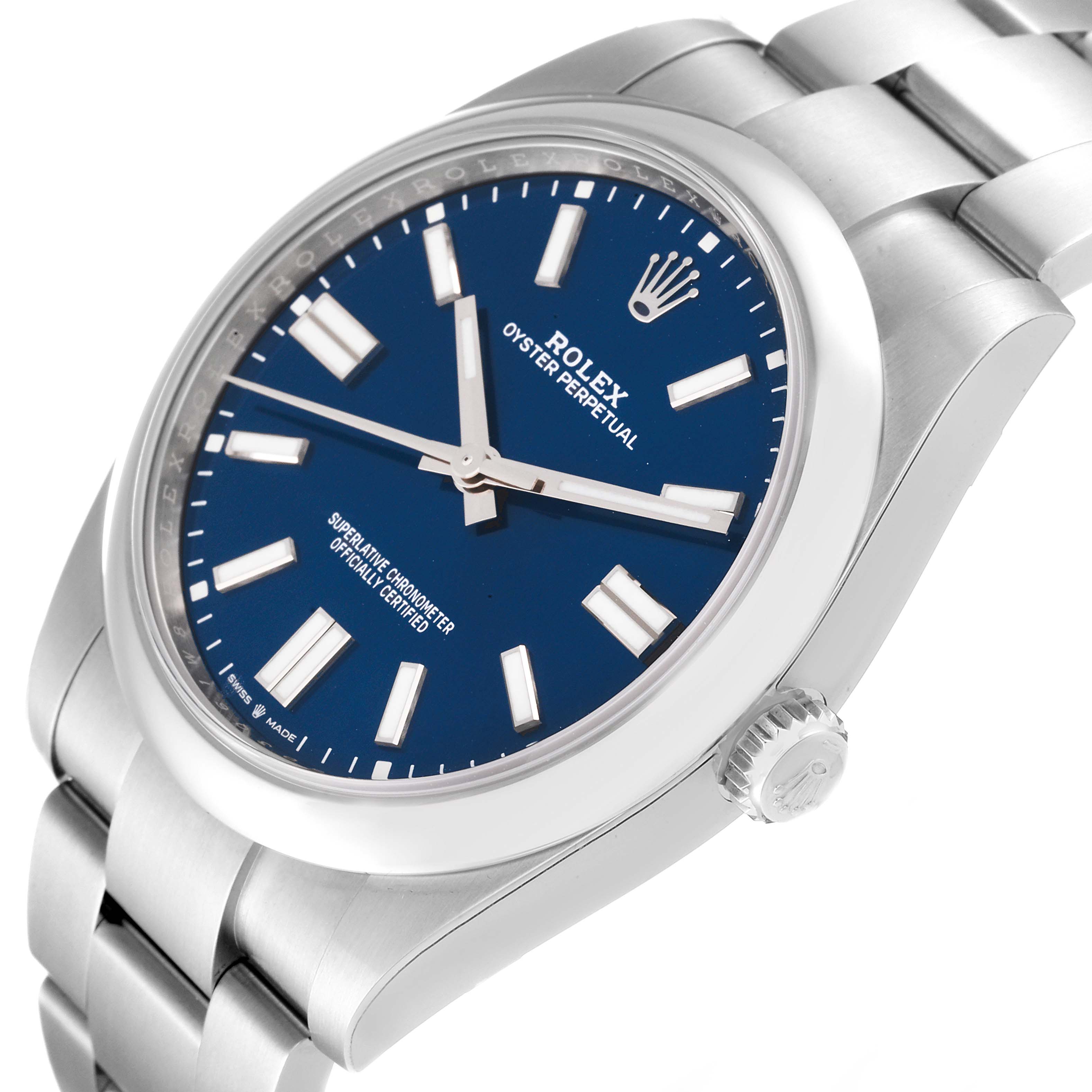 The image shows a close-up angle of a Rolex Oyster Perpetual 124300 Men's Stainless Steel Blue Dial 124300 Men's Stainless Steel Blue Dial watch with a blue dial and silver bracelet.
