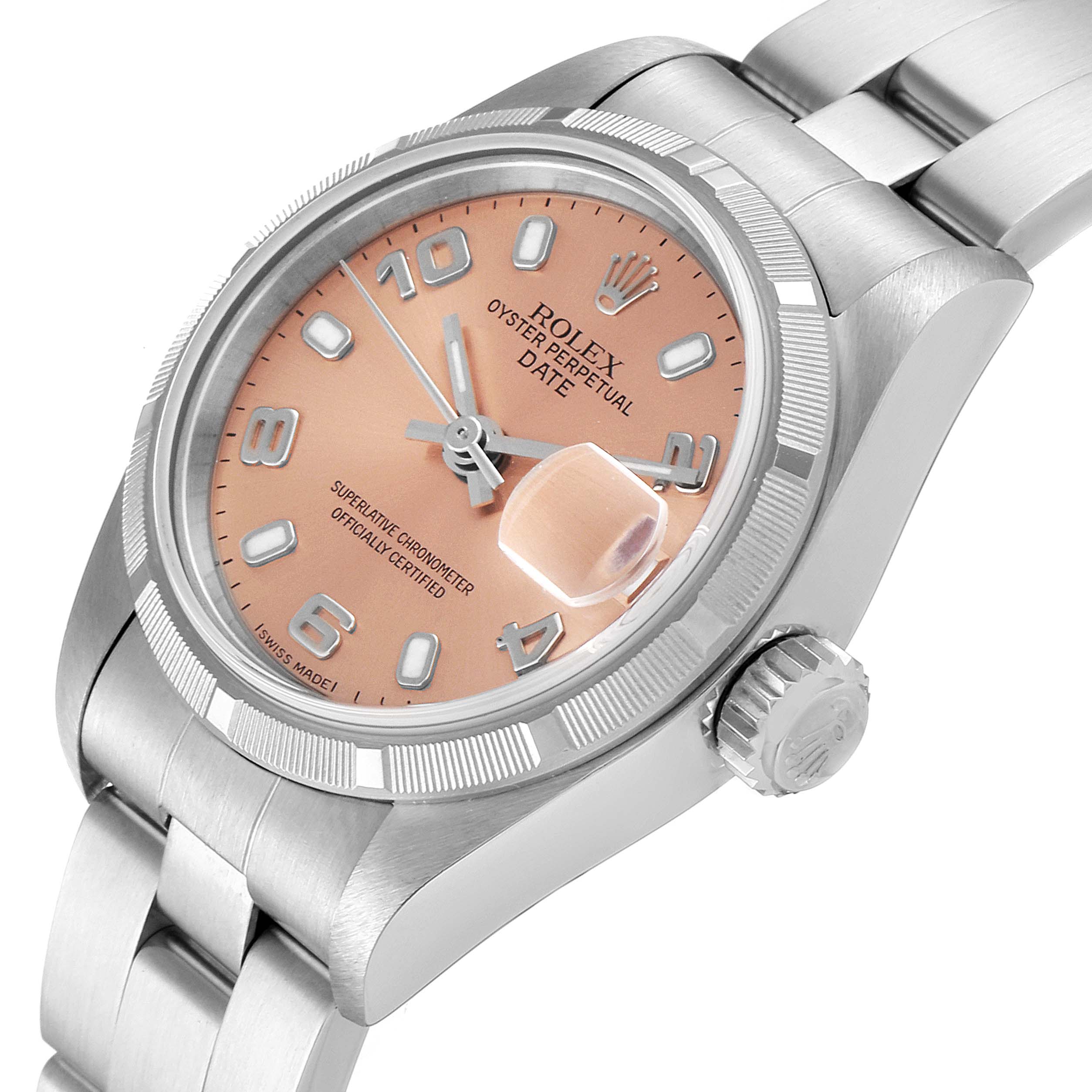 The image shows a close-up, tilted view of a Rolex Oyster Perpetual Date watch, highlighting the bezel, crown, and bracelet.