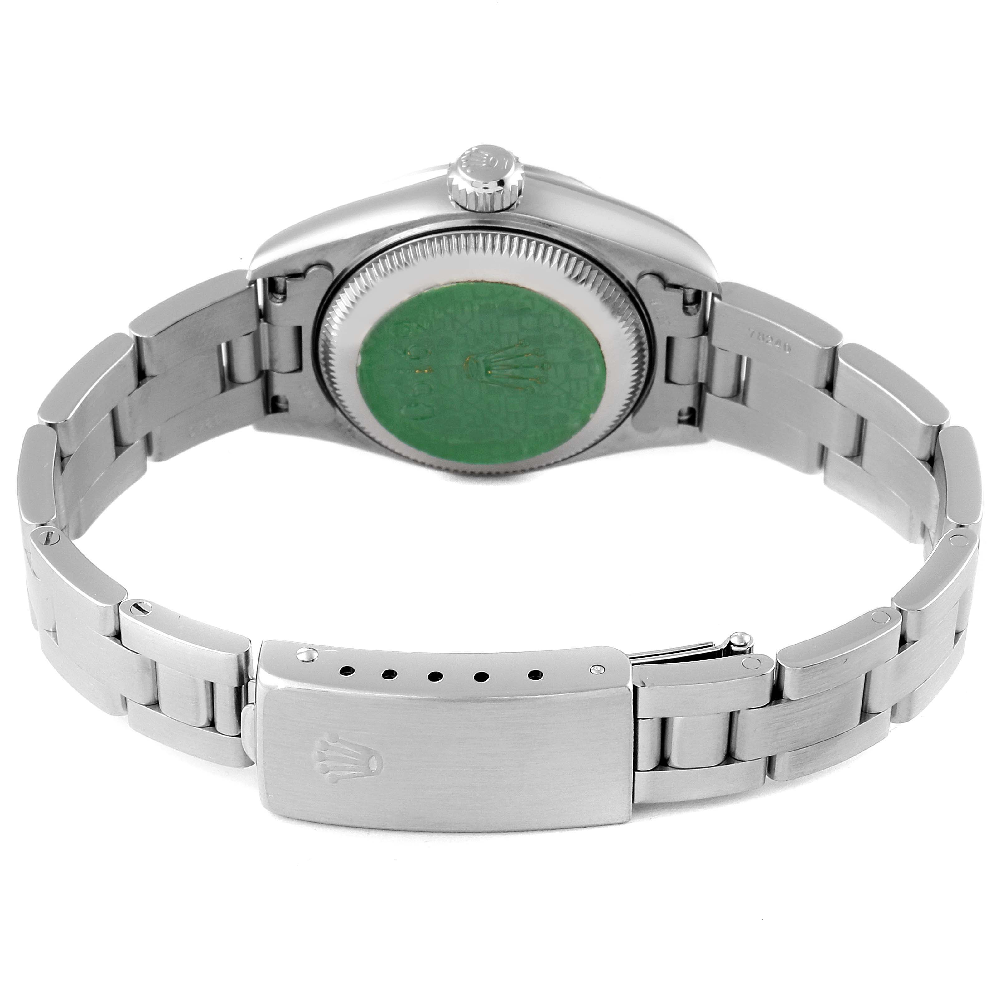 This image shows the back of a Rolex Date 69190 Women's Stainless Steel Pink Dial 69190 Women's Stainless Steel Pink Dial watch, highlighting its clasp, bracelet, and caseback.