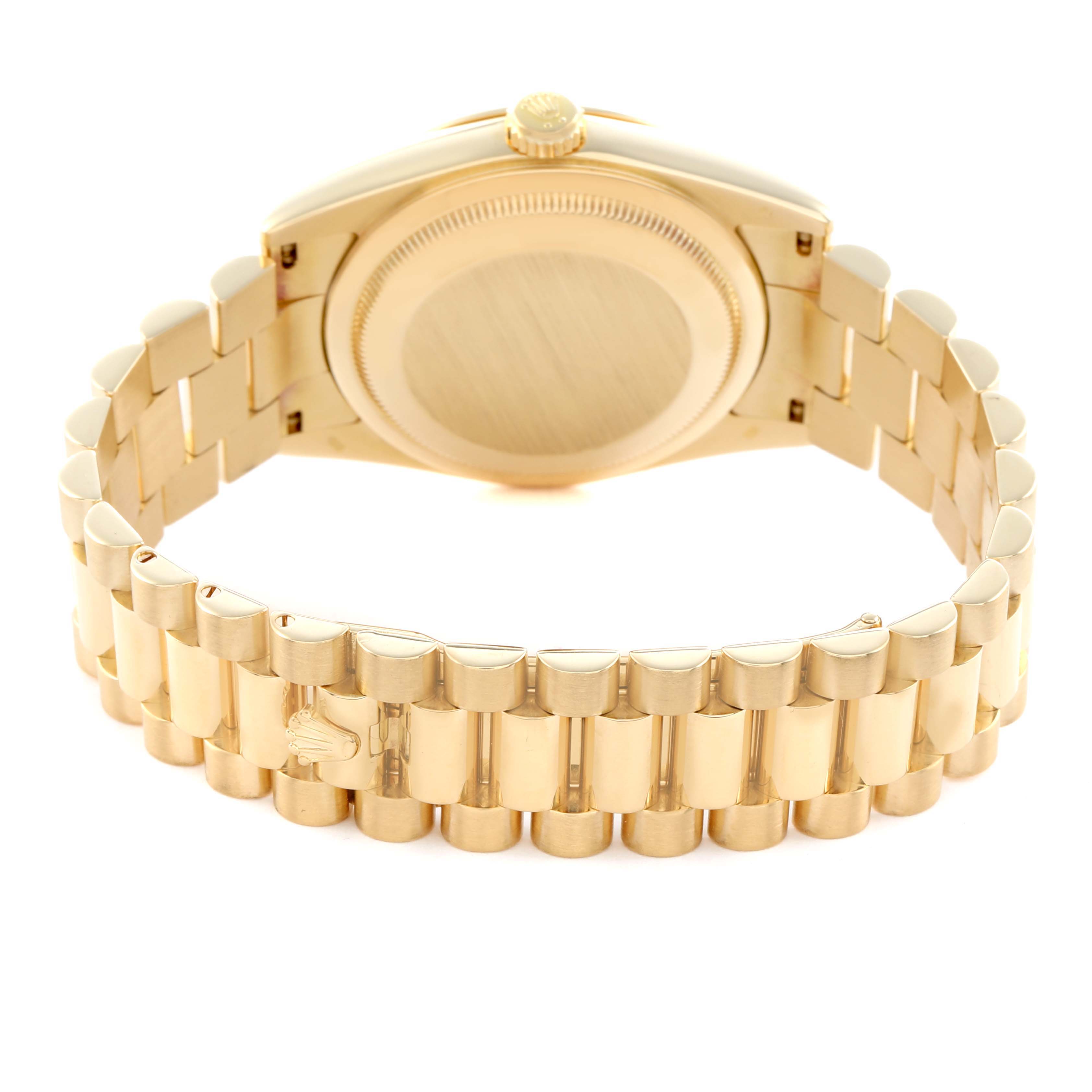 The image shows the back of a Rolex President 118238 Men
s Yellow Gold Champagne Dial model watch and its bracelet.