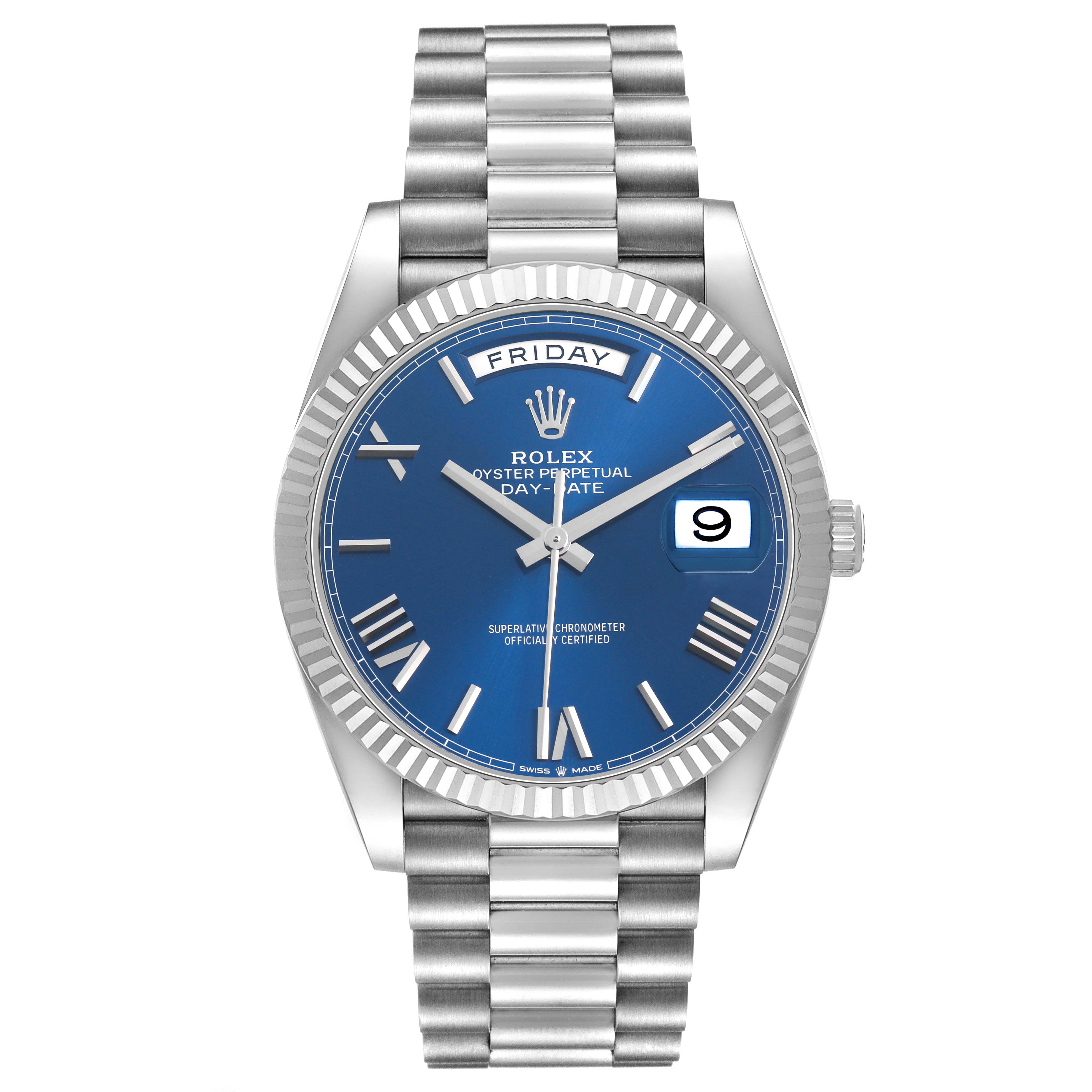 The Rolex President 228239 Men's White Gold Blue Dial model is shown from a front angle, highlighting its blue dial, day-date feature, and fluted bezel.
