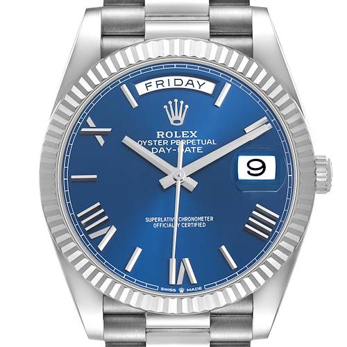 The Rolex President 228239 Men's White Gold Blue Dial model watch is shown from a front angle, displaying the dial, hands, day, and date features.