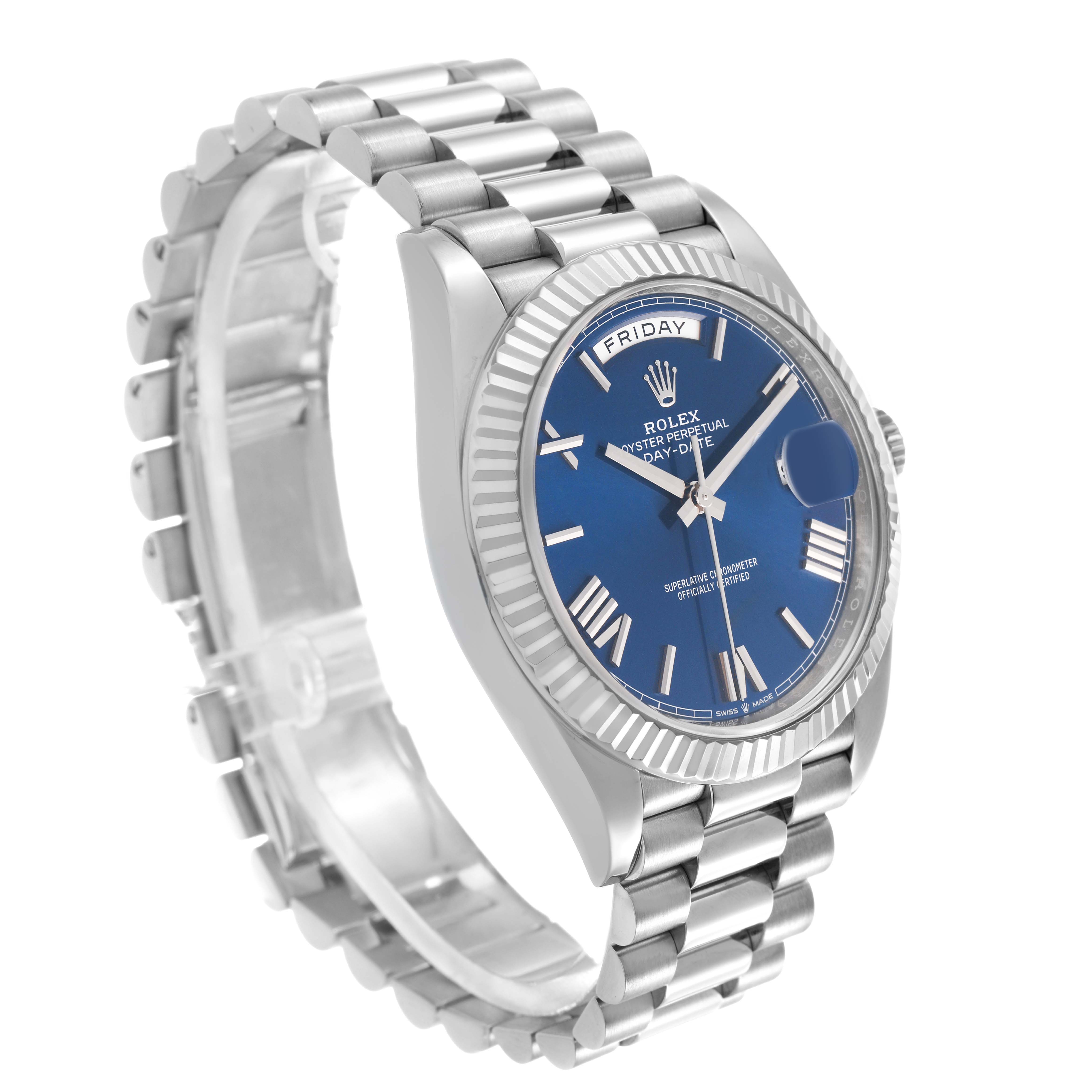 The Rolex President 228239 Men's White Gold Blue Dial model watch is shown at a three-quarter angle, highlighting its bracelet and blue dial.