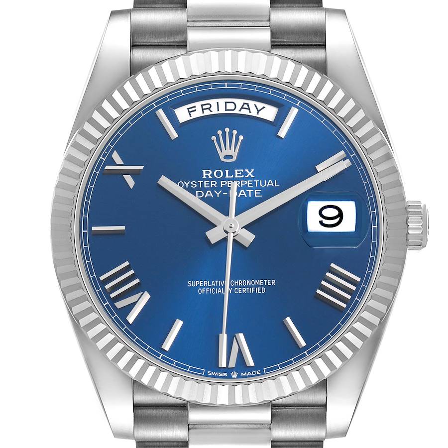 The Rolex President 228239 Men's White Gold Blue Dial model is shown from the front, displaying the blue dial, fluted bezel, and part of the bracelet.