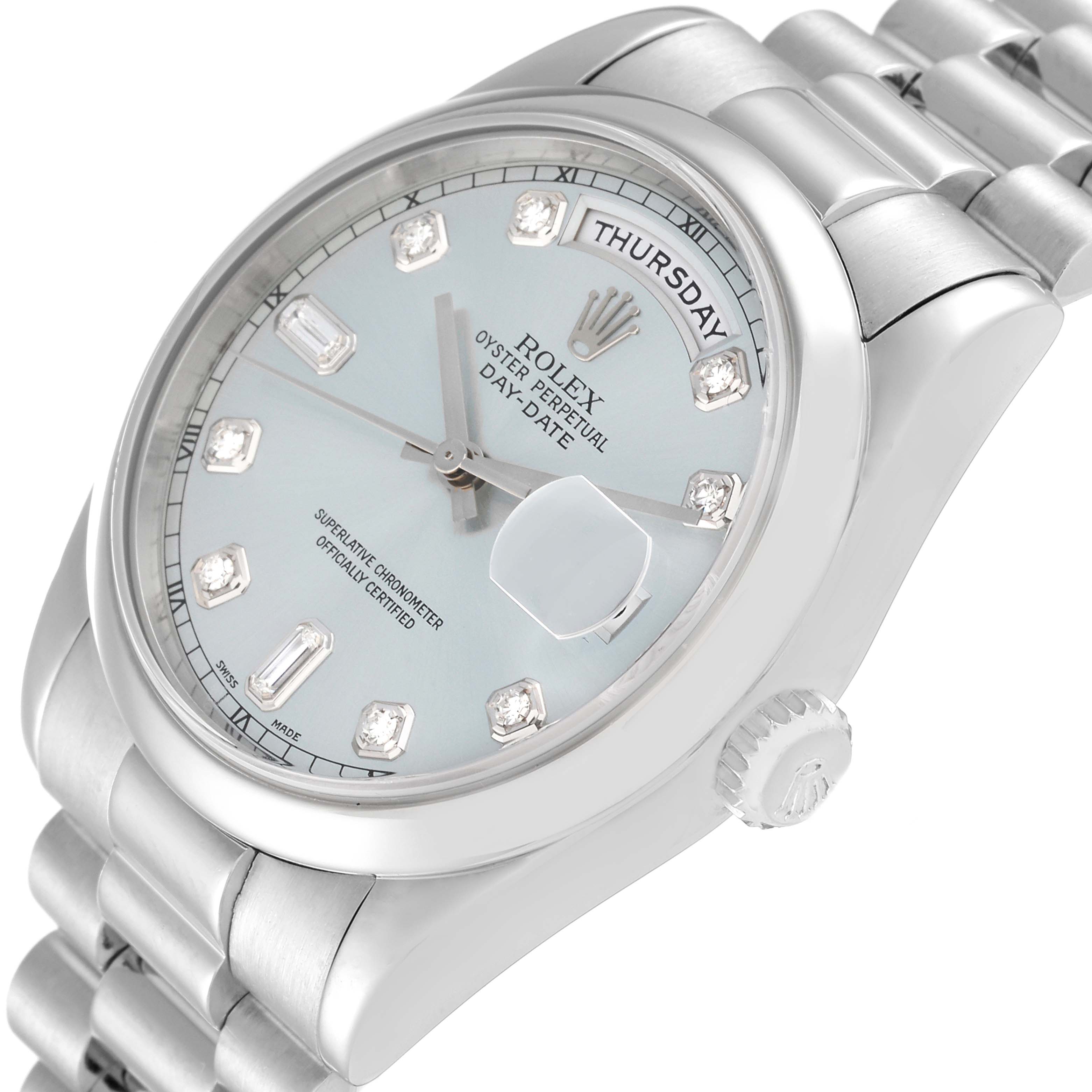 The image shows the face of the Rolex President 118206 Men's Platinum Blue Dial 118206 Men's Platinum Blue Dial model watch at an angle, highlighting the bracelet and the crown.