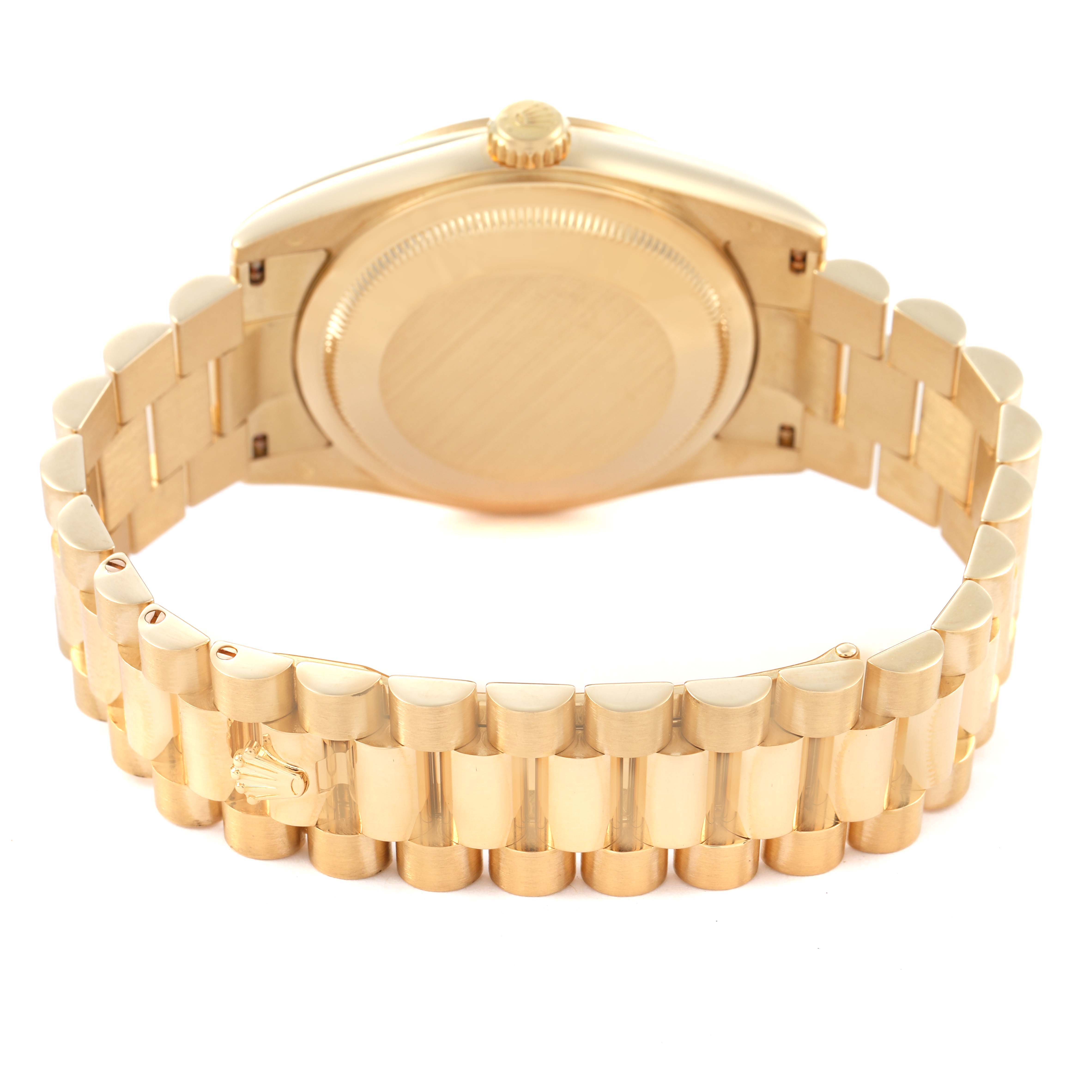The image shows the back case and bracelet of a Rolex President 118238 Men's Yellow Gold Champagne Dial model, viewed from the rear.
