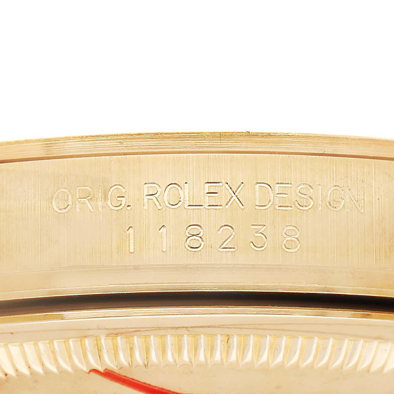 The image shows the side view of a Rolex President 118238 Men's Yellow Gold Champagne Dial model, highlighting the case with engraved model details.