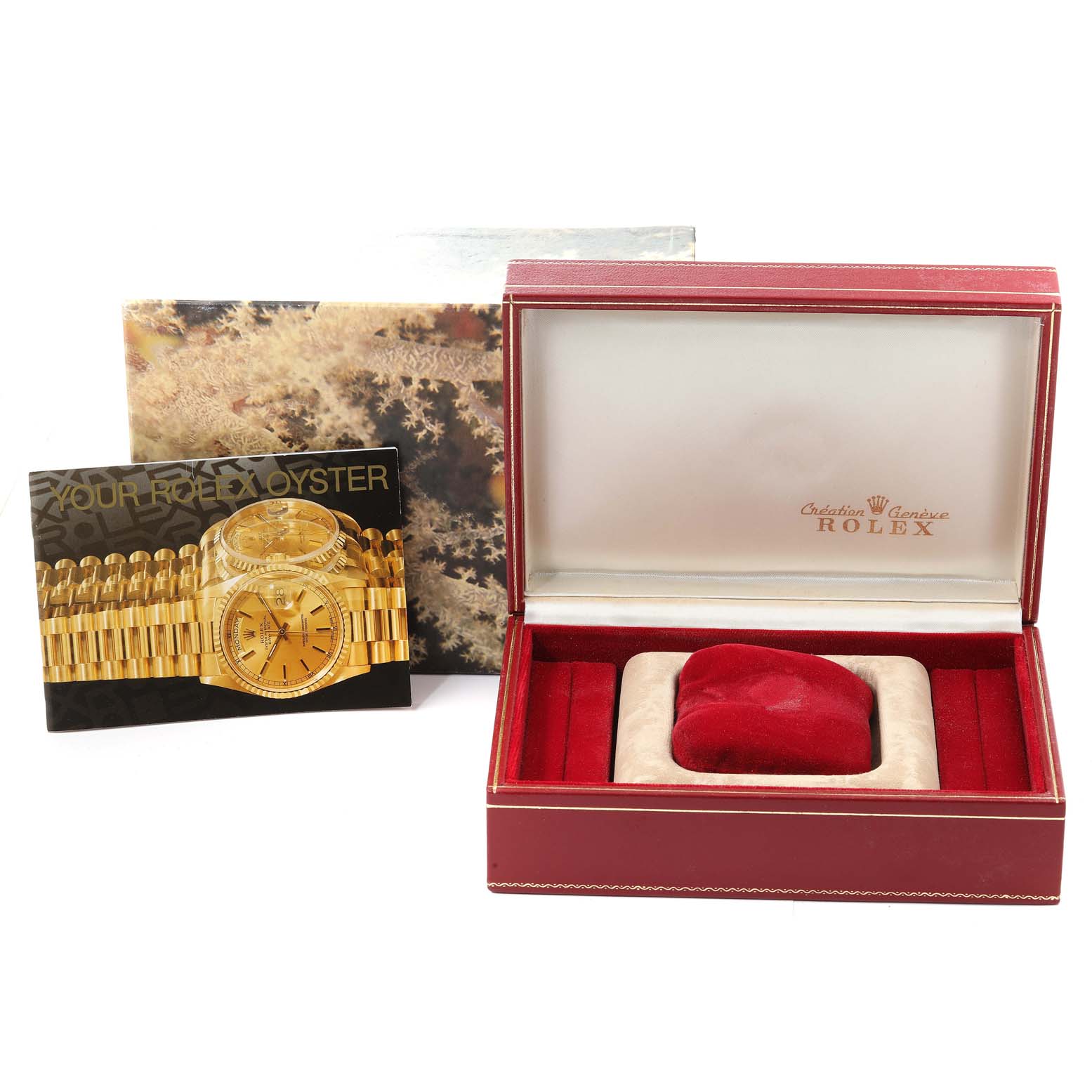 This image shows the empty box and booklet for a Rolex President 69136 Women's Stainless Steel Silver Dial 69136 Women's Stainless Steel Silver Dial model watch, displayed from the front.