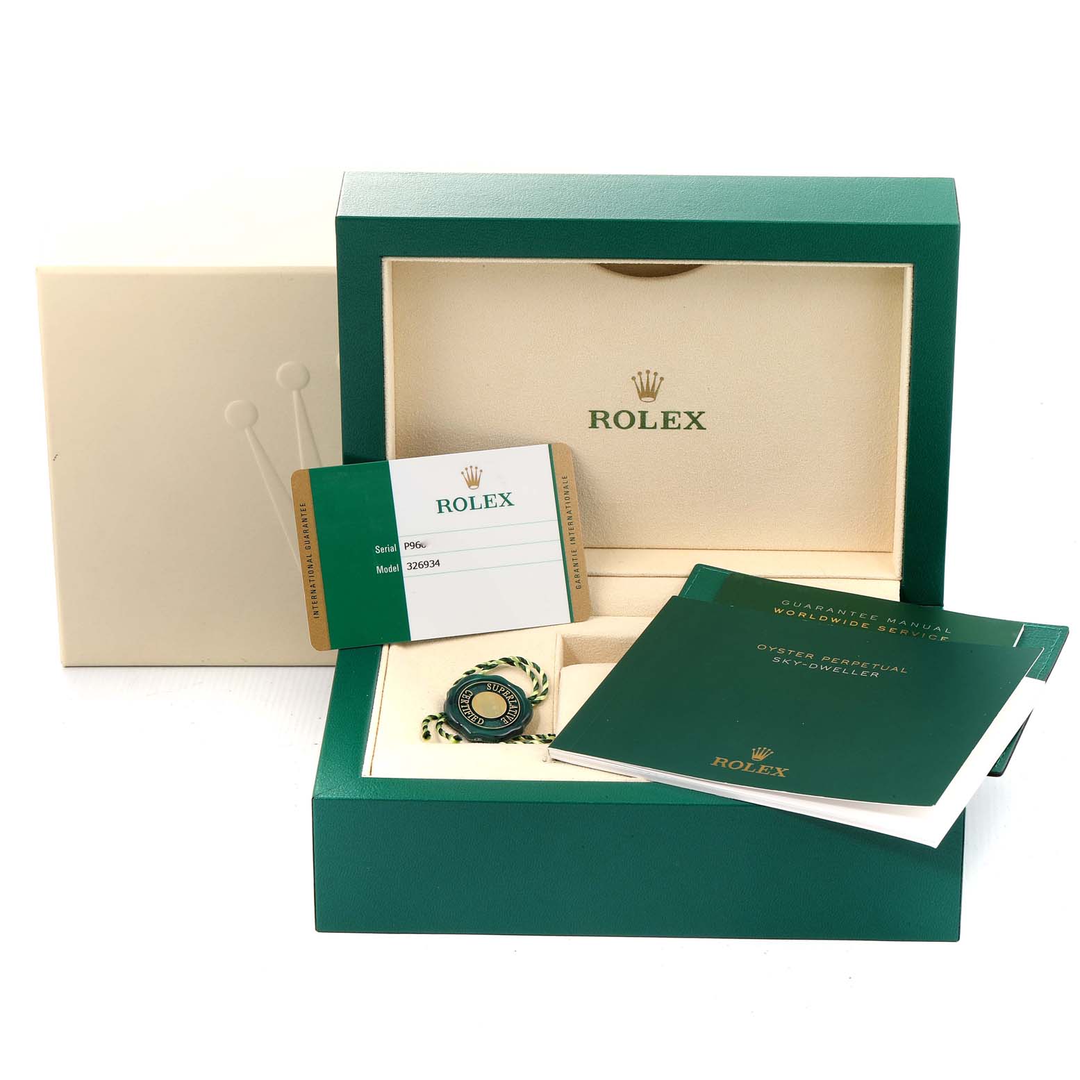 The image shows the packaging and accessories of a Rolex Sky-Dweller 326934 Men's Stainless Steel Blue Dial 326934 Men's Stainless Steel Blue Dial, including the box, warranty card, hang tag, and manuals.
