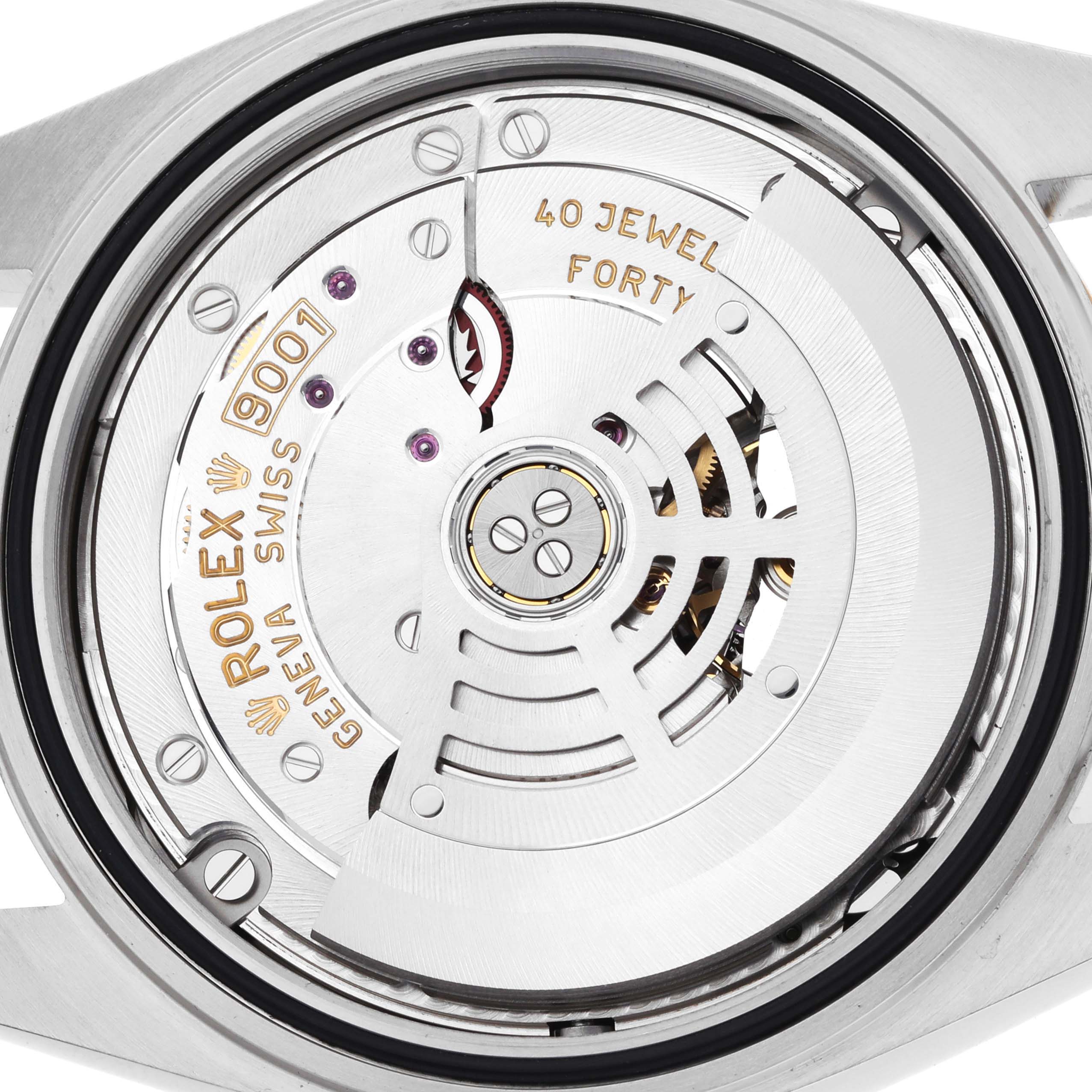 This image shows the movement of a Rolex Sky-Dweller 326933 Men
s Steel and Gold (two tone) Black Dial, highlighting the rotor and mechanical parts from the back angle.