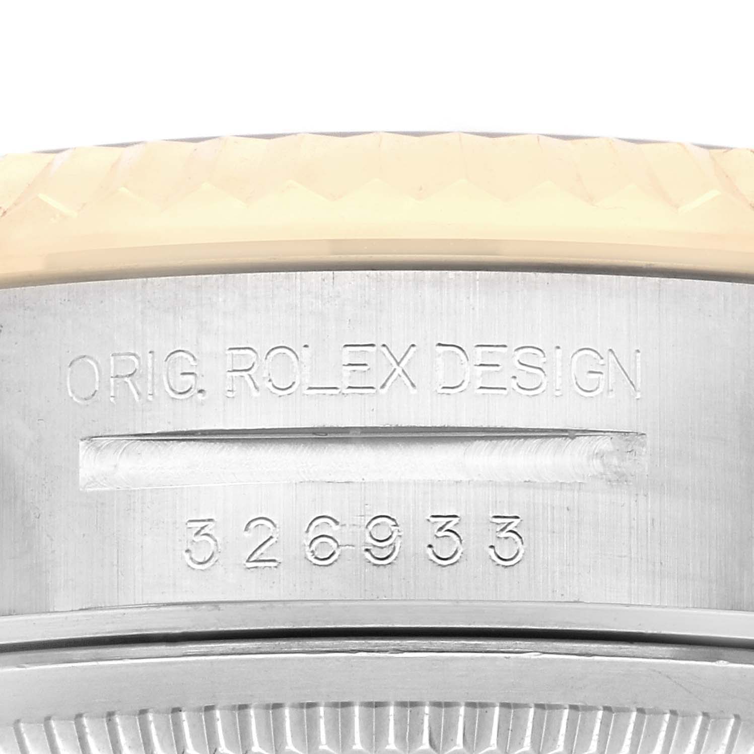 The image shows a close-up side view of a Rolex Sky-Dweller 326933 Men
s Steel and Gold (two tone) Black Dial, highlighting the engraved model number and “ORIG. ROLEX DESIGN.”