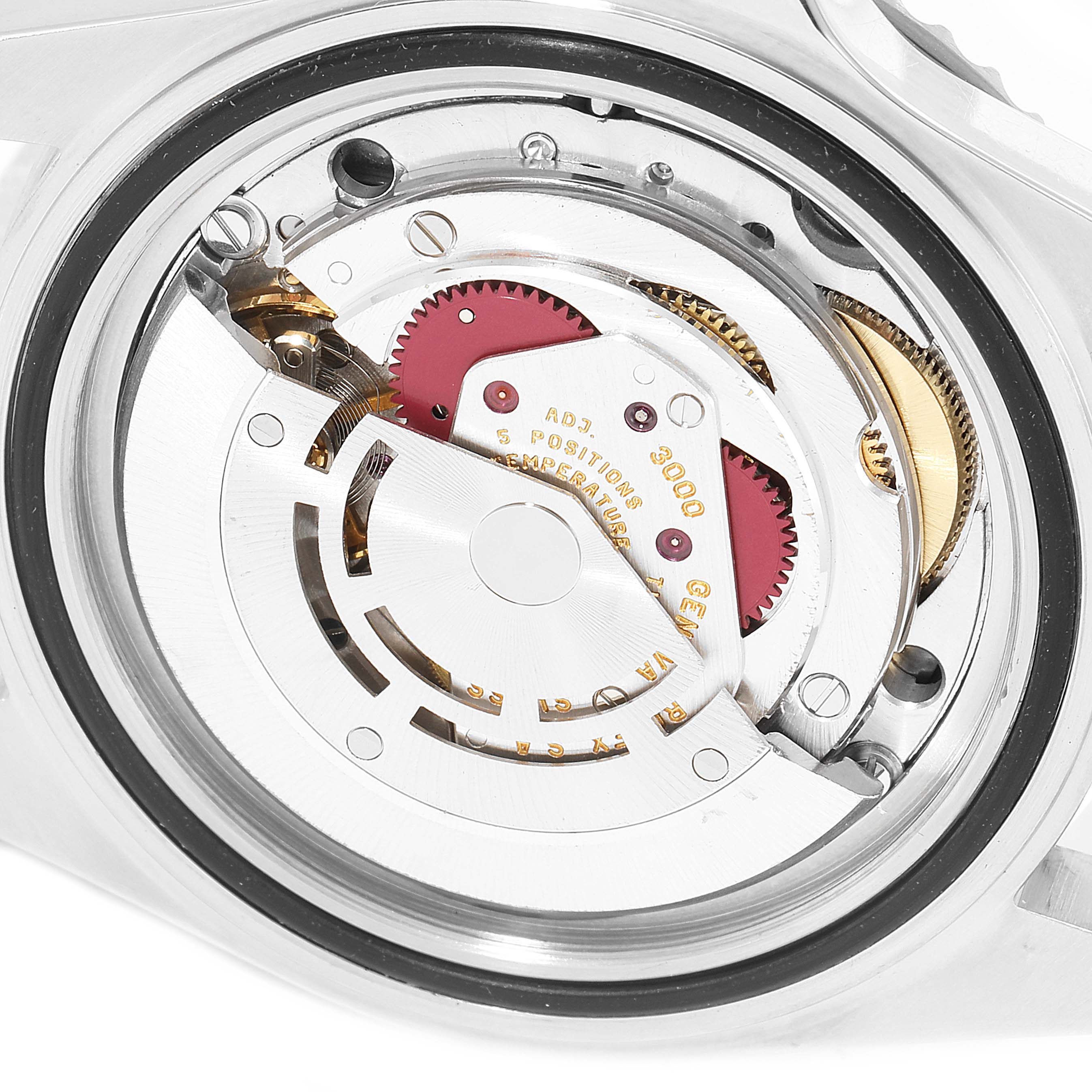 This image shows a close-up of the inner mechanism of a Rolex Submariner 14060 Men
s Stainless Steel Black Dial 14060 Men
s Stainless Steel Black Dial watch, highlighting gears and intricate details.