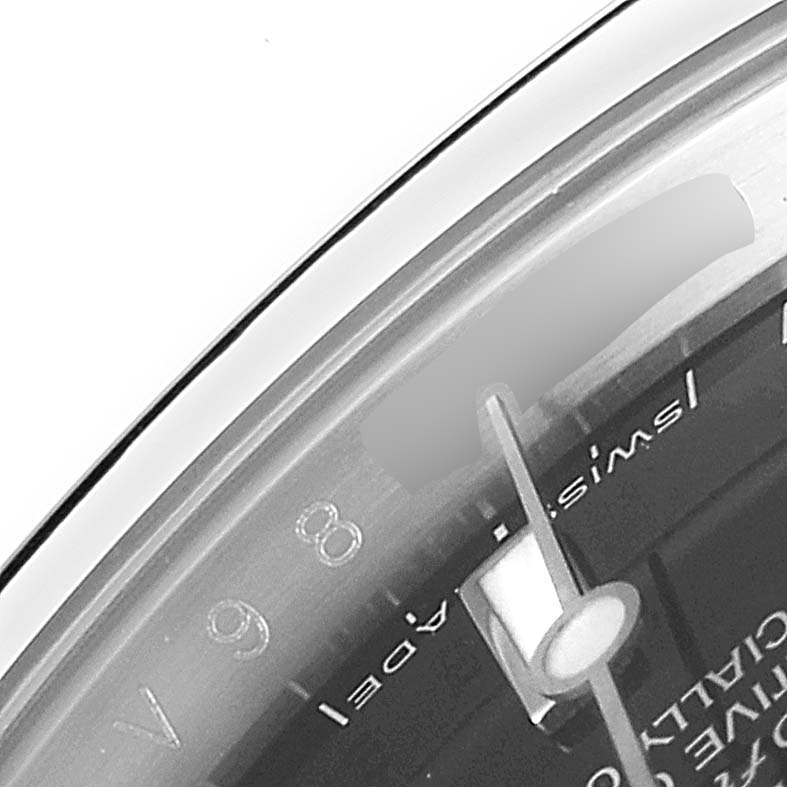 This image shows a close-up view of the dial and part of the bezel of a Rolex Submariner 14060 Men's Stainless Steel Black Dial 14060 Men's Stainless Steel Black Dial watch.