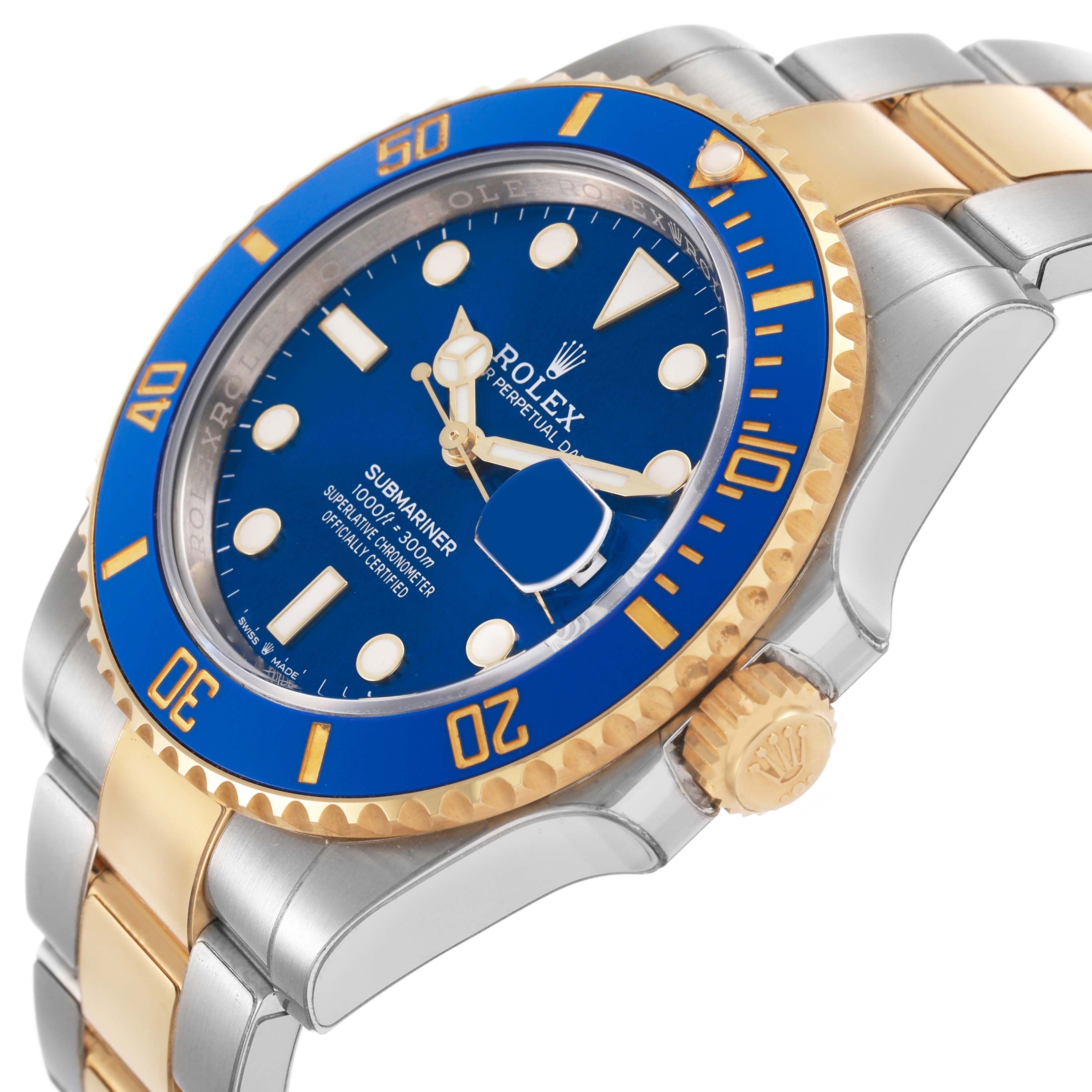 The Rolex Submariner 126613LB Men's Steel and Gold (two tone) Blue Dial watch is shown at a side angle, highlighting its blue dial, bezel, crown, and two-tone bracelet.