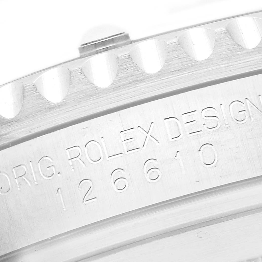 The image shows a side angle of the Rolex Submariner 126610 Men
s Stainless Steel Black Dial
s bezel and engraved case model number.