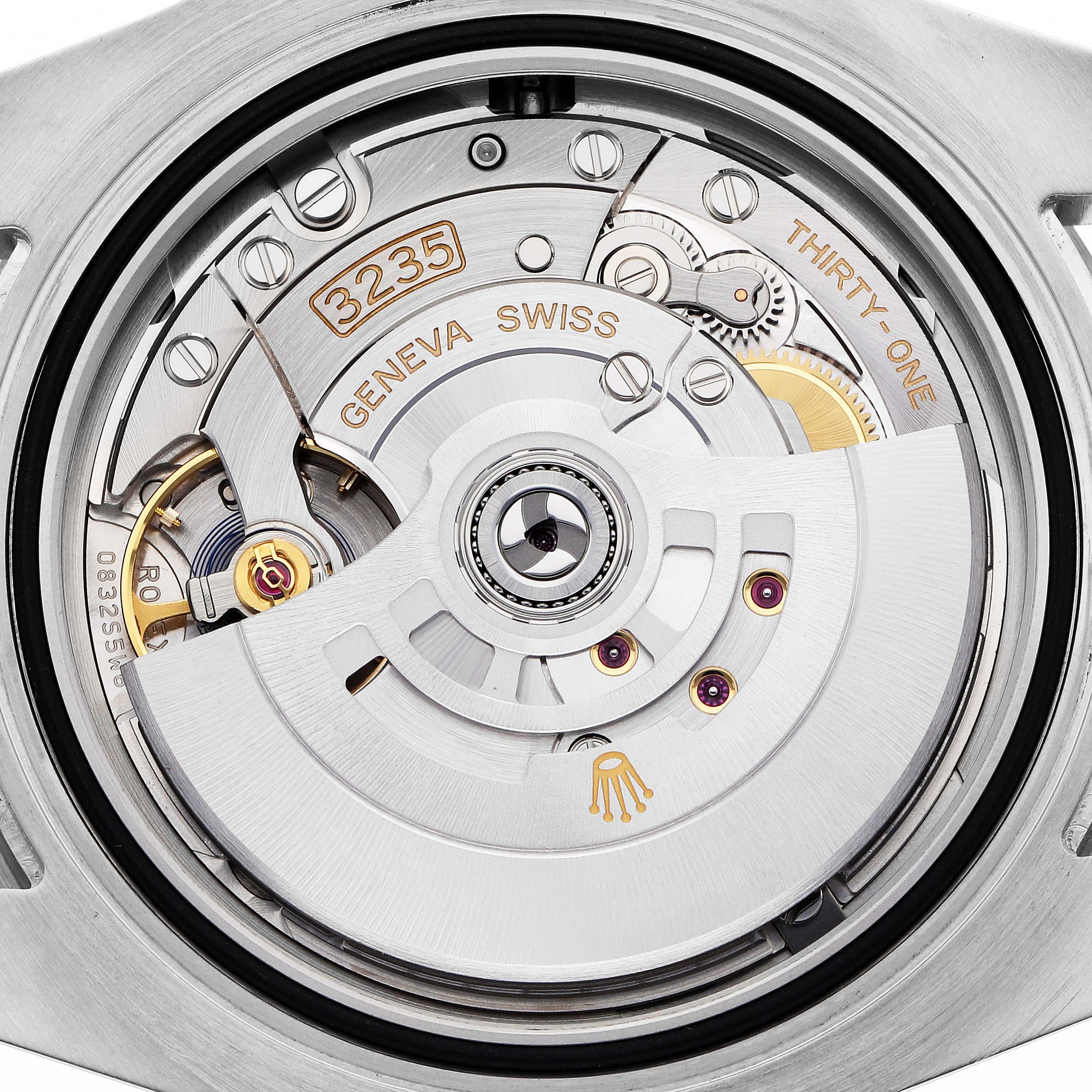 The image shows a close-up view of the movement of a Rolex Submariner 126610 Men
s Stainless Steel Black Dial watch, highlighting the rotor and visible gears.