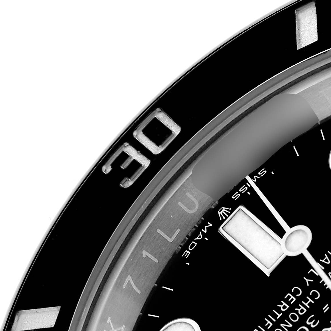 The image shows a close-up of the bezel and part of the dial of the Rolex Submariner 126610 Men
s Stainless Steel Black Dial.