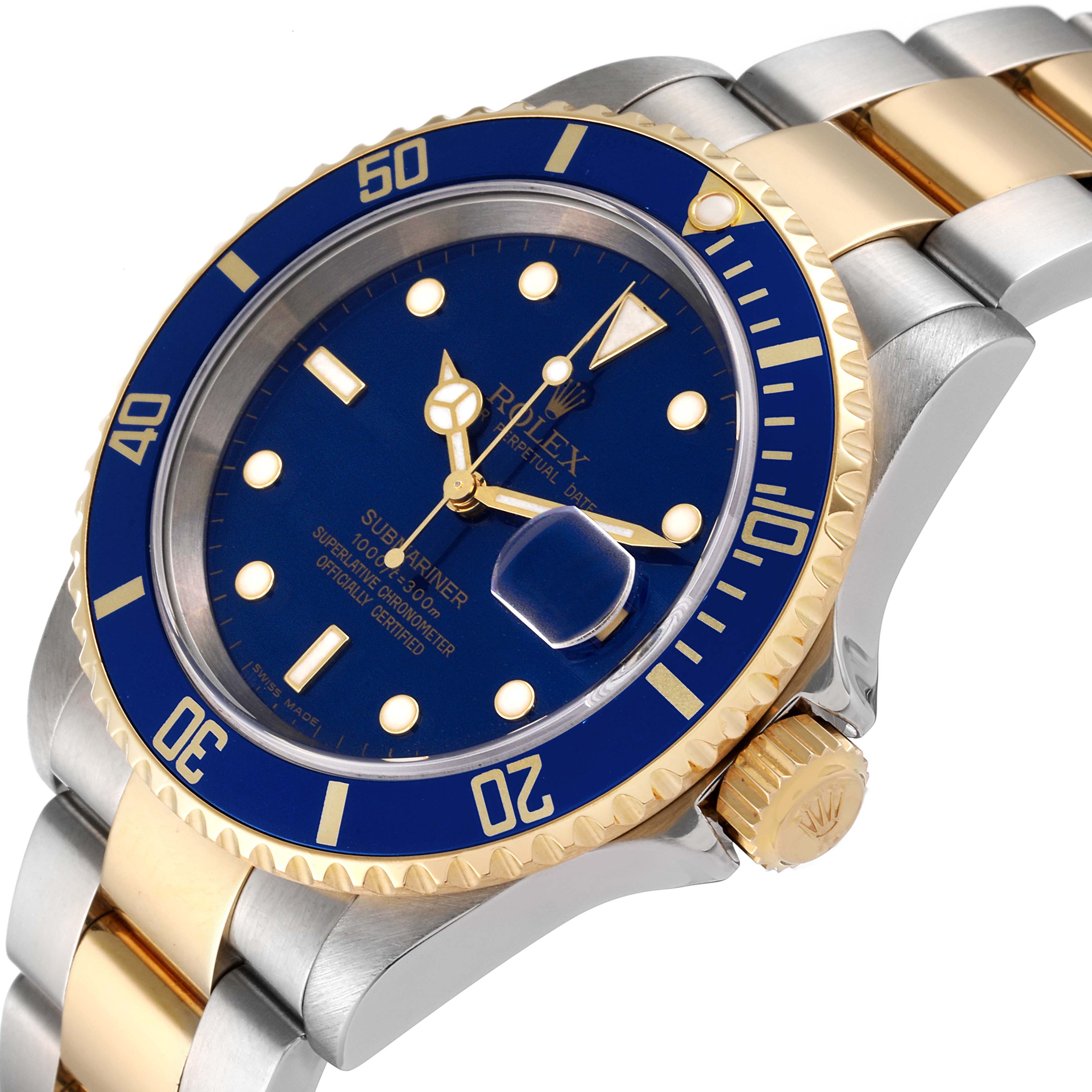 The image shows a close-up angle of the Rolex Submariner 16613 Men's Steel and Gold (two tone) Blue Dial 16613 Men's Steel and Gold (two tone) Blue Dial watch, highlighting the blue dial, blue bezel, and the two-tone bracelet.
