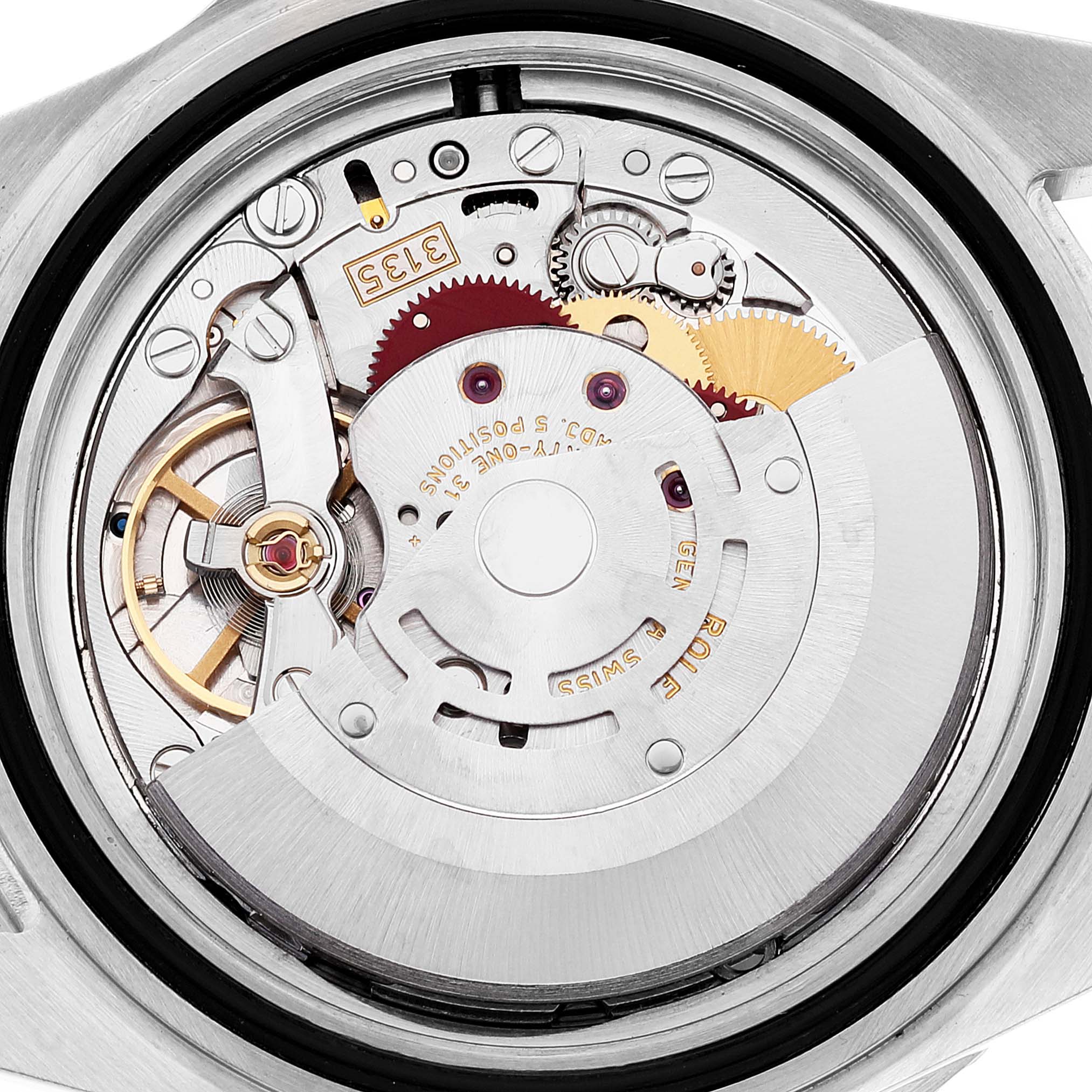 The image shows the internal mechanical movement parts of a Rolex Submariner 16613 Men's Steel and Gold (two tone) Blue Dial 16613 Men's Steel and Gold (two tone) Blue Dial watch viewed from the back.