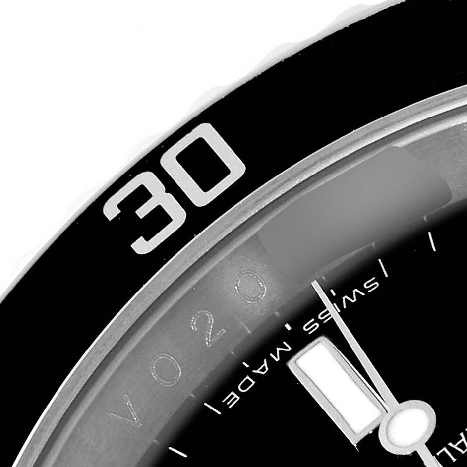 The image shows a close-up of the bezel and dial of a Rolex Submariner 16610 Men
s Stainless Steel Black Dial 16610 Men
s Stainless Steel Black Dial watch, highlighting the "30" marker and part of the minute hand.