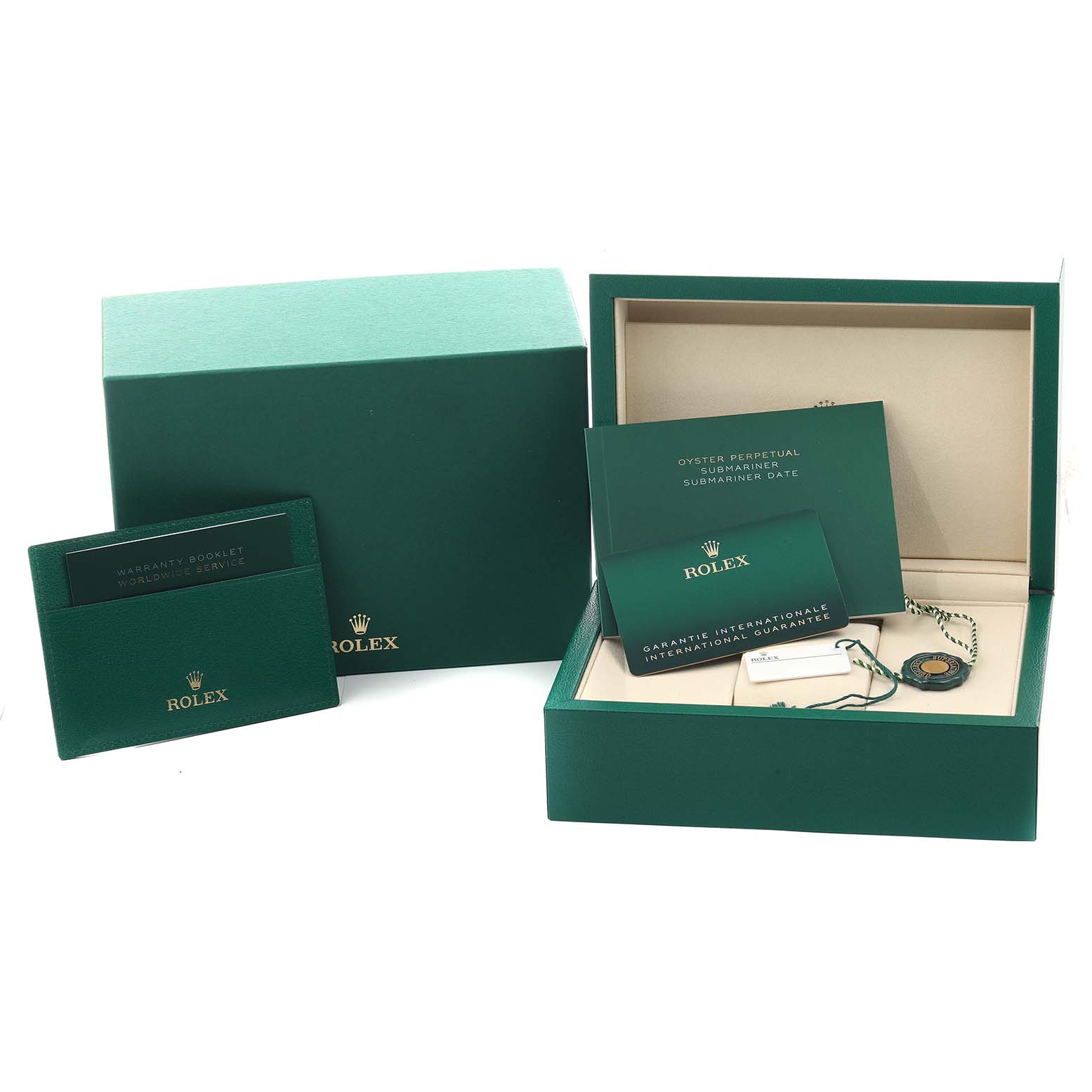 The image shows the packaging and accessories for a Rolex Submariner 126610LV Men
s Stainless Steel Black Dial, including the box, warranty booklets, and a green tag.