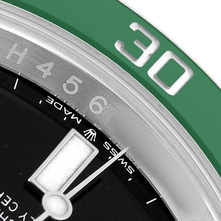 The image shows a close-up of the bezel, dial, and hands of a Rolex Submariner 126610LV Men's Stainless Steel Black Dial, highlighting the numbers and iconic design.