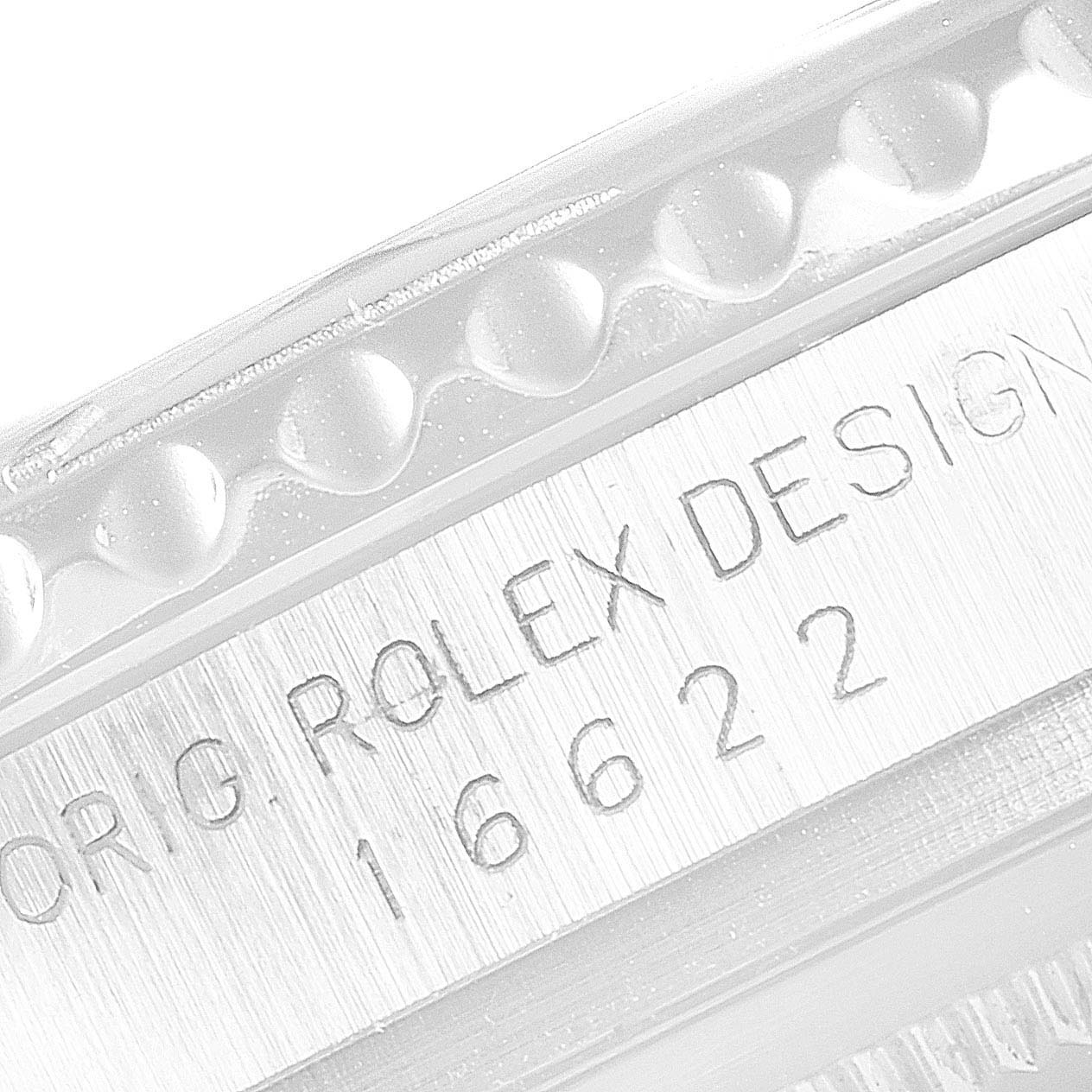 The image shows a close-up of the bezel and serial number engraving on a Rolex Yacht-Master 16622 Men's Platinum Silver Dial 16622 Men's Platinum Silver Dial watch.