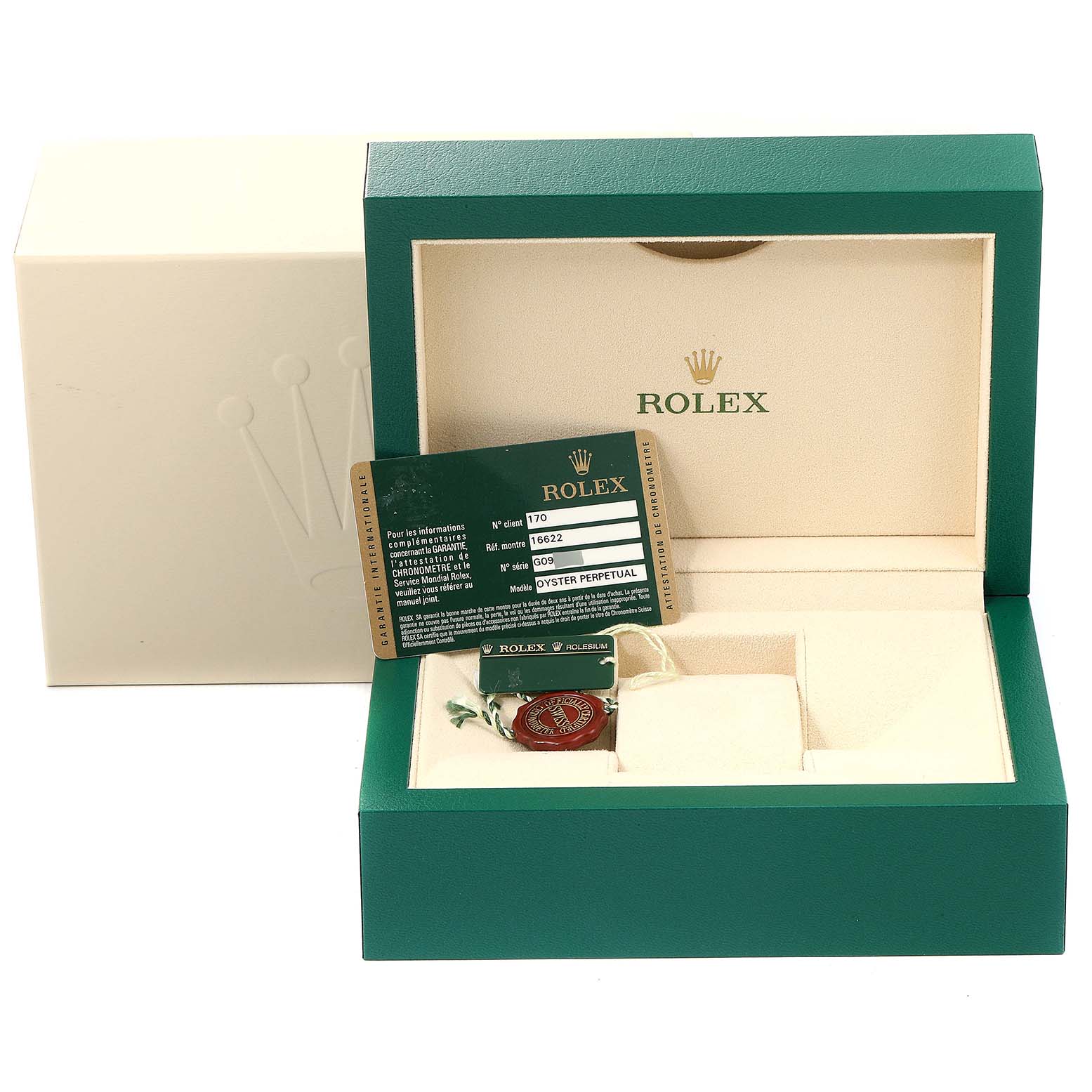 The image shows a Rolex Yacht-Master 16622 Men
s Stainless Steel Silver Dial 16622 Men
s Stainless Steel Silver Dial watch, inside an open green and beige box, with tags and a warranty card visible.