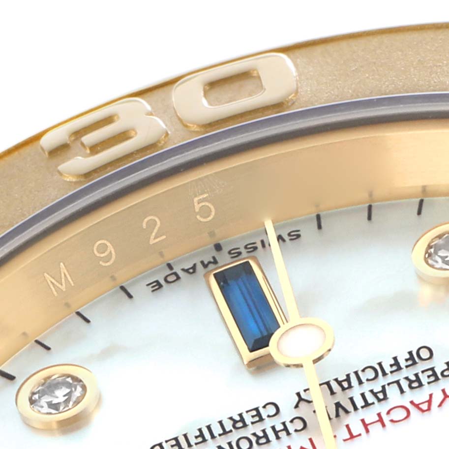 The image shows a close-up of the Rolex Yacht-Master 16628B Men
s Yellow Gold Mother of Pearl Dial watch
s bezel, dial, and markers at an angled view.