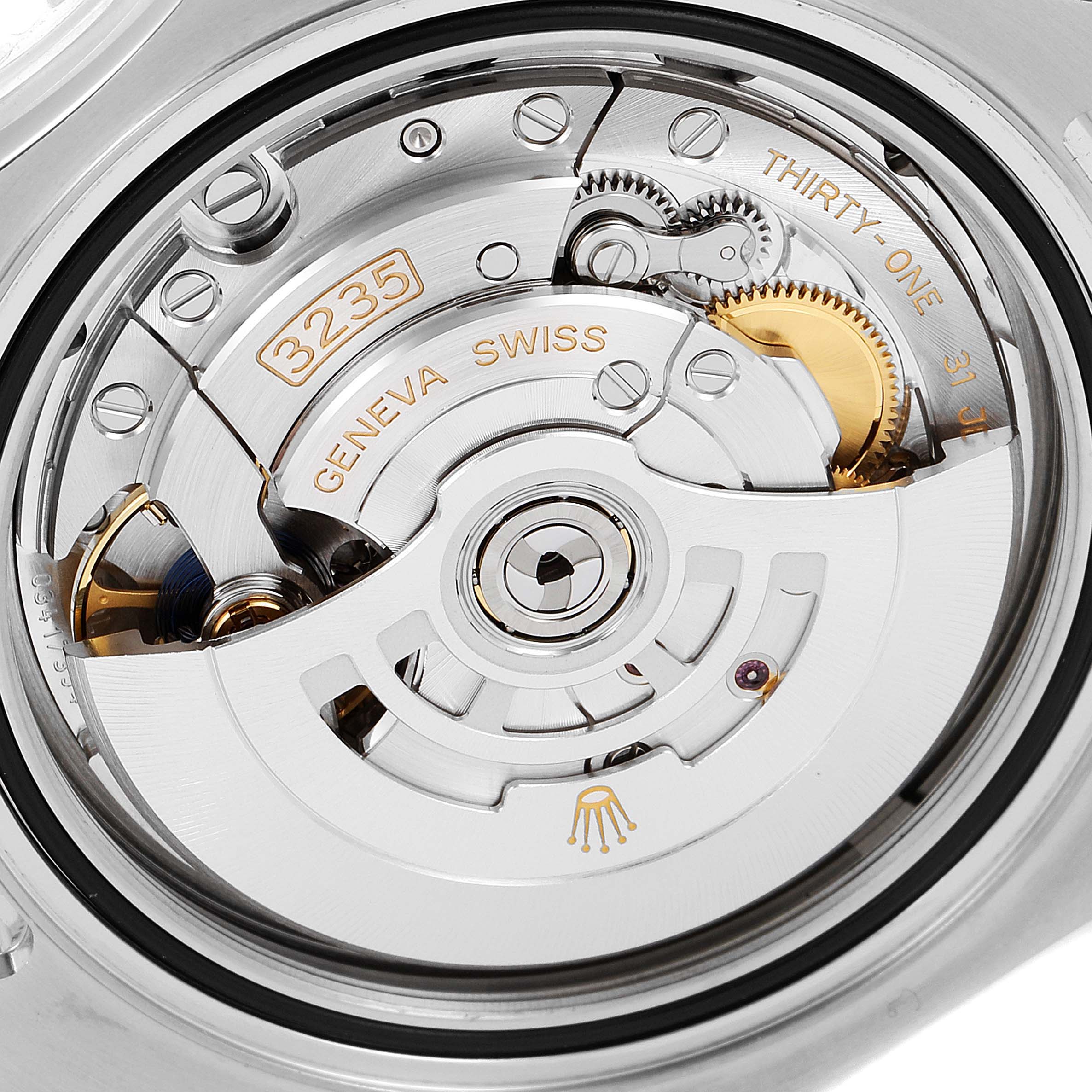 This image shows a close-up view of the Rolex Yacht-Master 126622 Men
s Stainless Steel Blue Dial 126622 Men
s Stainless Steel Blue Dial watch
s movement mechanism, highlighting the 3235 caliber. 