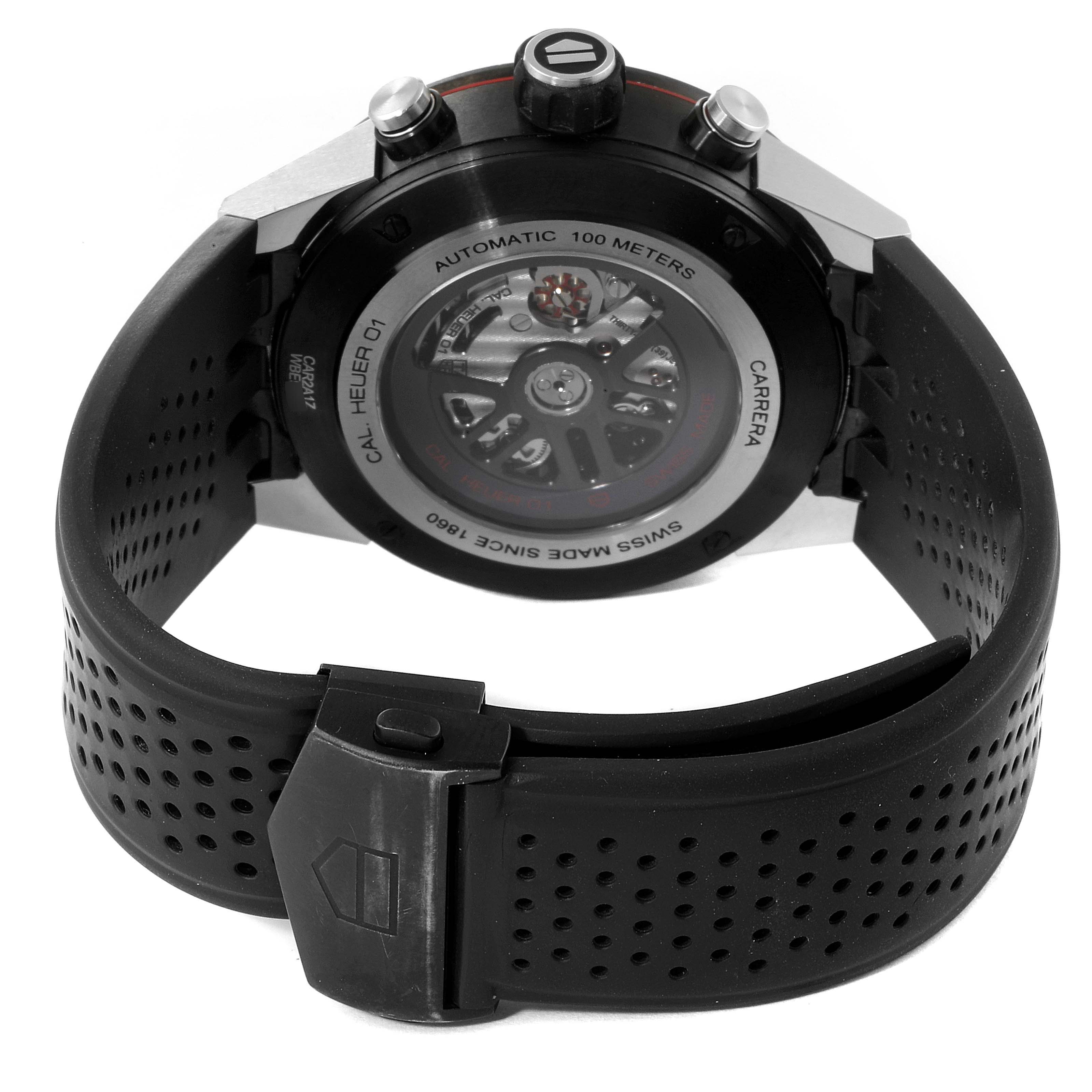 The image shows the back and clasp of a Tag Heuer Carrera CAR2A1Z.FT6044 Men
s Stainless Steel Black Dial CAR2A1Z.FT6044 Men
s Stainless Steel Black Dial watch, highlighting its automatic movement and rubber strap.