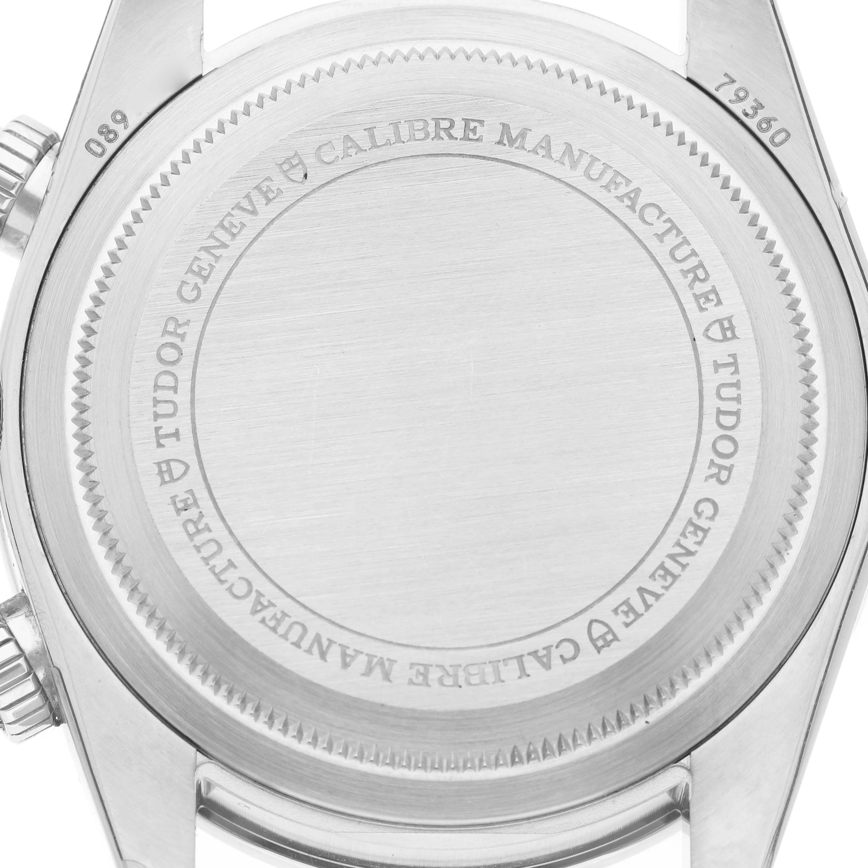 The image shows the back of a Tudor Heritage Black Bay M79360N Men's Stainless Steel Pink Dial watch, focusing on the engraved case back.