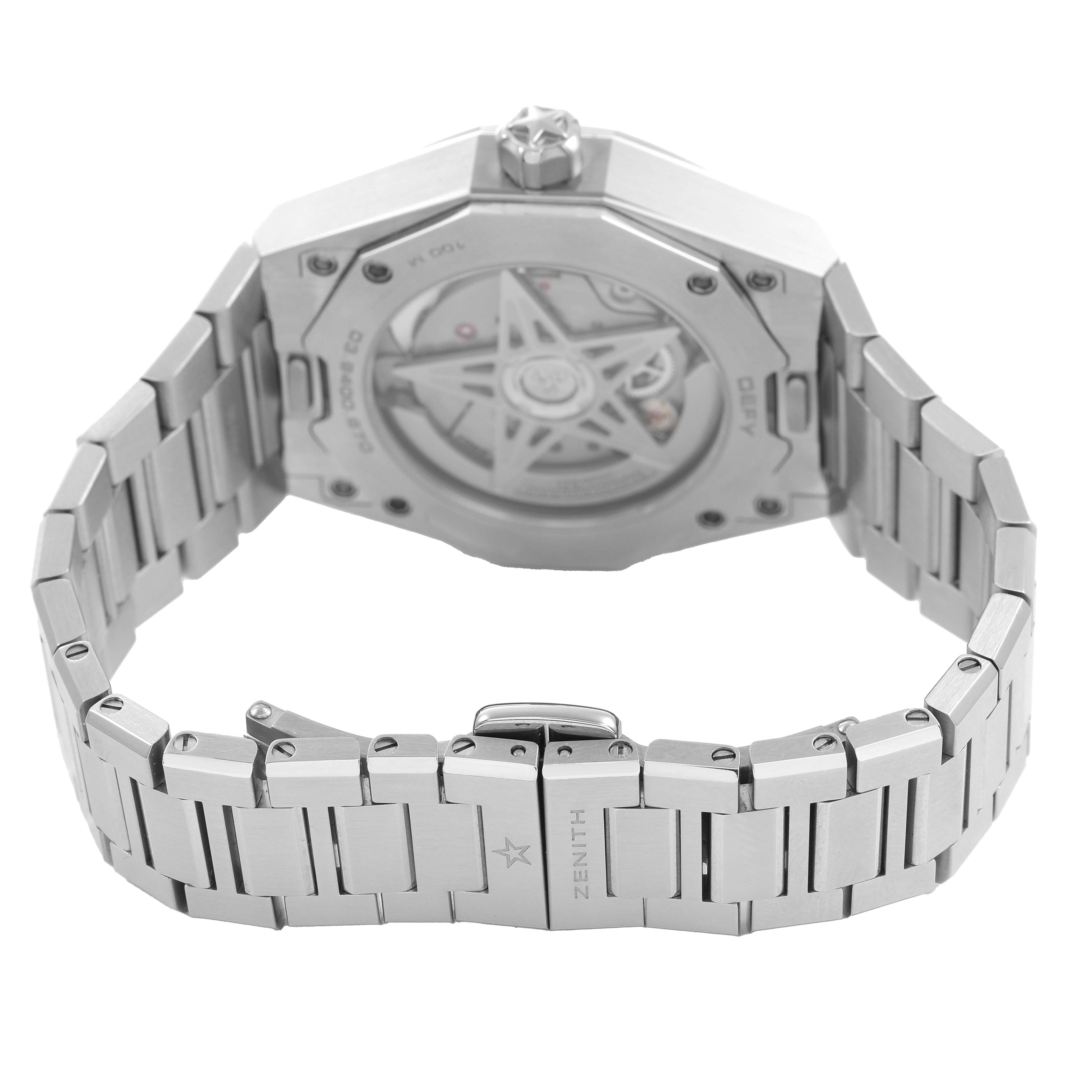 The Zenith Defy 03.9400.670/61.I001 Men's Stainless Steel Green Dial model is shown from the back, highlighting the exhibition case back and stainless steel bracelet.