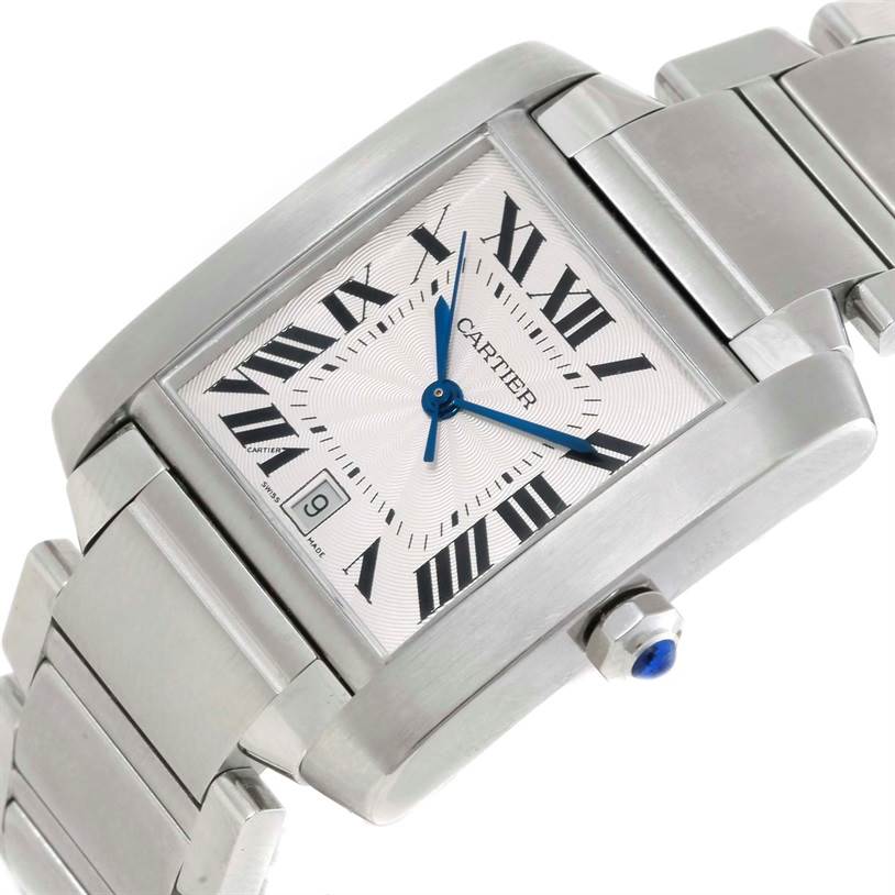 The image shows an angled view of the Cartier W51002Q3 Stainless Steel Silver Dial W51002Q3 Stainless Steel Silver Dial Tank Francaise Large Stainless Steel Mens Watch W51002Q3, displaying the dial, bracelet, and crown.