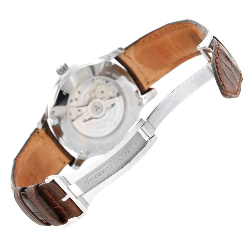 The image shows the back view of the Jaeger LeCoultre Master 146.8.02 Men's Stainless Steel Silver Dial 146.8.02 Men's Stainless Steel Silver Dial model watch, highlighting its open case back and leather strap with a deployant clasp.