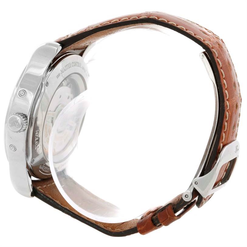The Jaeger LeCoultre Master 147.8.41.S Men's Stainless Steel Silver Dial 147.8.41.S Men's Stainless Steel Silver Dial watch is shown from a side angle, displaying the case back, crown, and brown leather strap with a clasp.