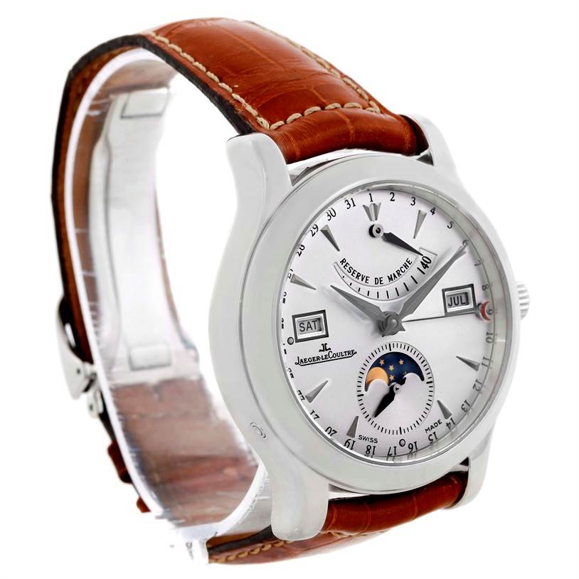 The image shows a Jaeger-LeCoultre Master model watch, angled to display its dial, brown leather strap, and calendar features.