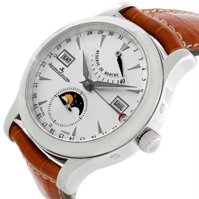 The Jaeger LeCoultre Master 147.8.41.S Men's Stainless Steel Silver Dial 147.8.41.S Men's Stainless Steel Silver Dial watch is shown at an oblique angle highlighting its white dial, power reserve indicator, moon phase, day, and month displays.