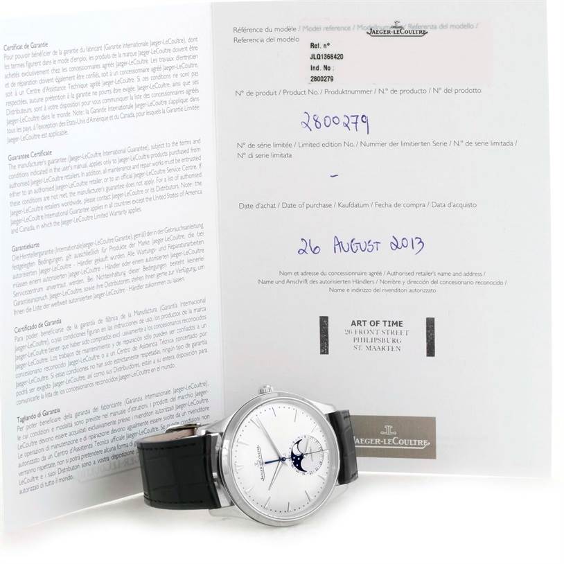 The Jaeger-LeCoultre Master model watch is displayed with its warranty certificate and purchase documentation.