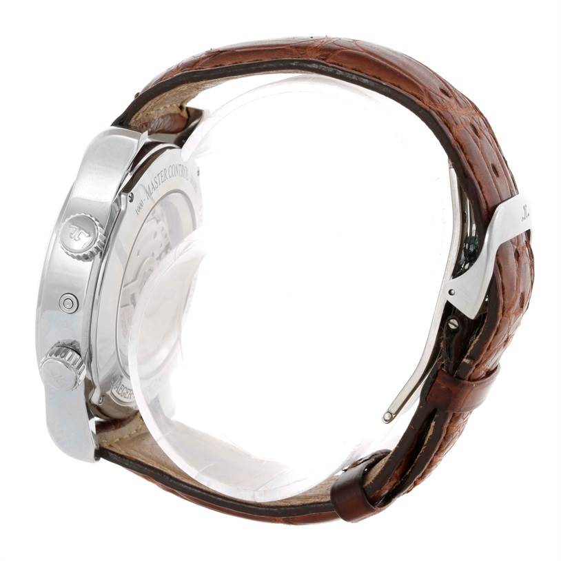 The image shows a side view of a Jaeger-LeCoultre Master model watch, highlighting its crown, pushers, and brown leather strap.