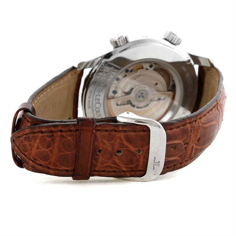 The image shows the back view of a Jaeger LeCoultre Master 146.8.32.S Q1528420 Men's Stainless Steel Silver Dial 146.8.32.S Q1528420 Men's Stainless Steel Silver Dial model watch, highlighting its leather strap and mechanical movement.