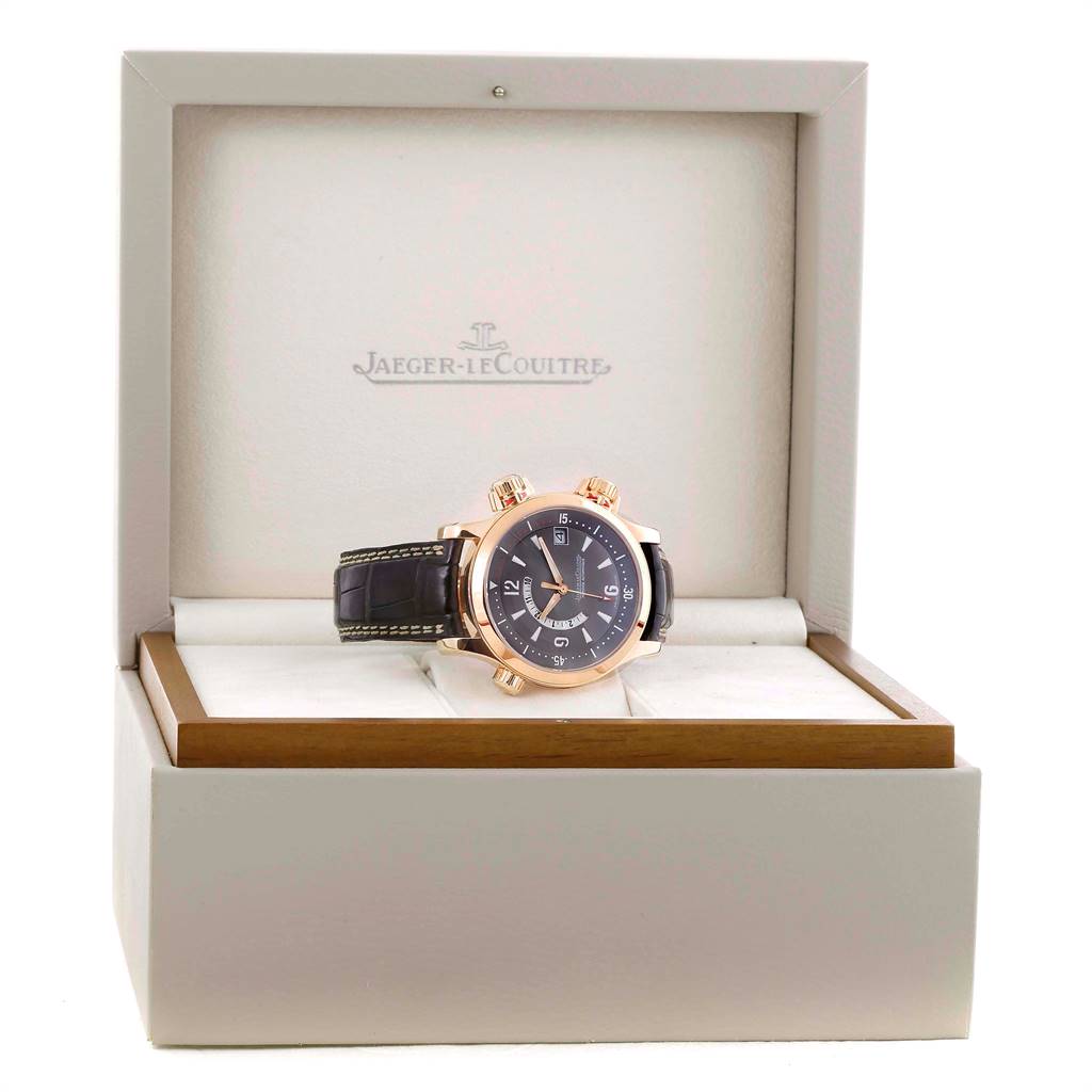 The Jaeger LeCoultre Master Q1702440 Men's Rose Gold Black Dial Q1702440 Men's Rose Gold Black Dial model watch is shown front-facing inside its branded box with a leather strap visible.
